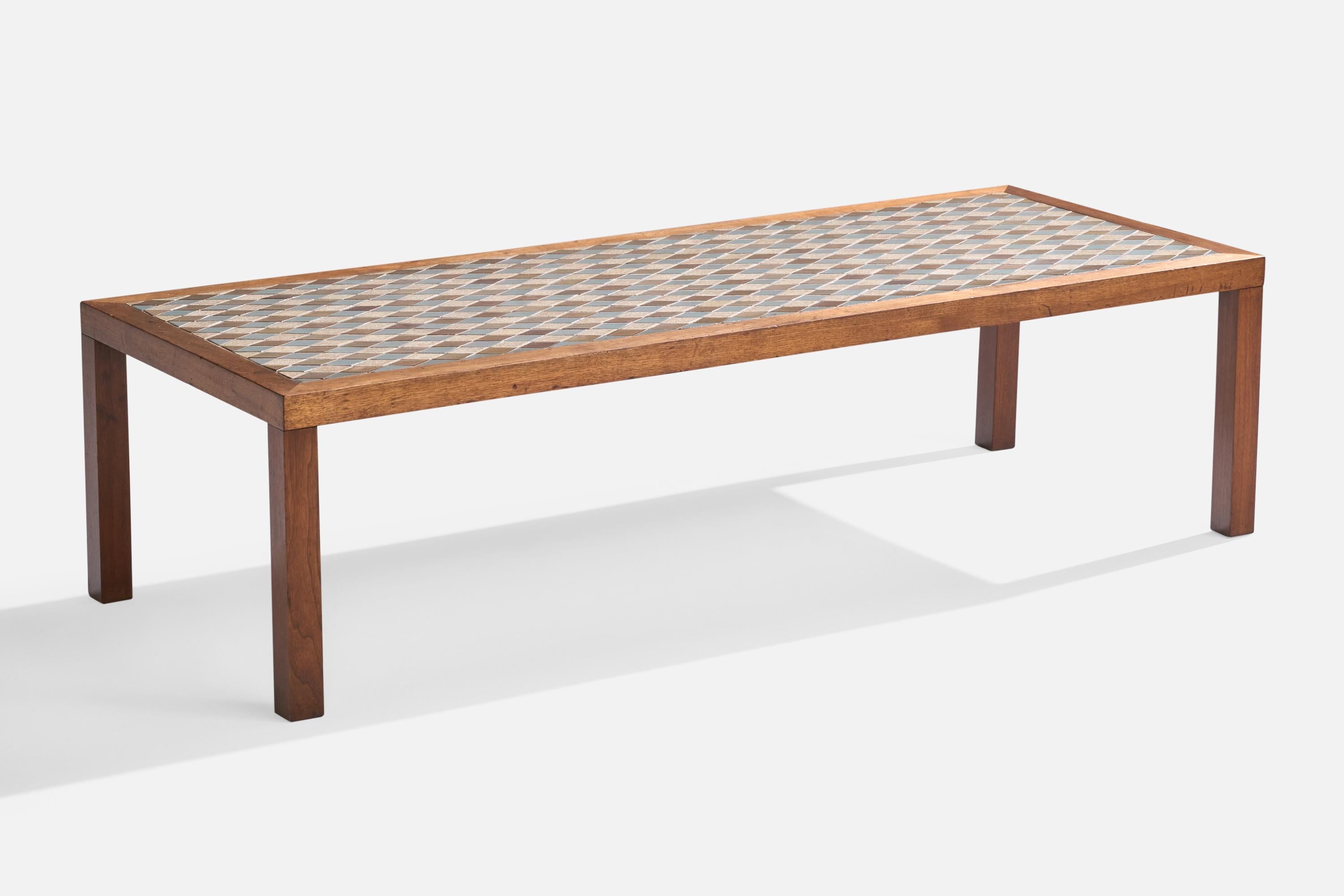 A walnut and blue brown beige ceramic tile coffee table designed by Jane & Gordon Martz and produced by Marshall Studios, USA, c. 1960s.

Dimensions: 16” H x 60.4” W x 23” D