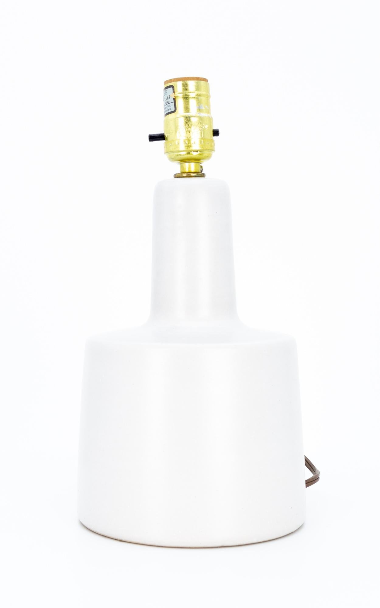 Jane & Gordon Martz mid century white ceramic lamp
This piece measures 6.5 wide x 6.5 deep x 12 inches high and weighs 3 pounds

This lamp is in excellent vintage condition.

Each piece is carefully cleaned and packaged before being shipped to