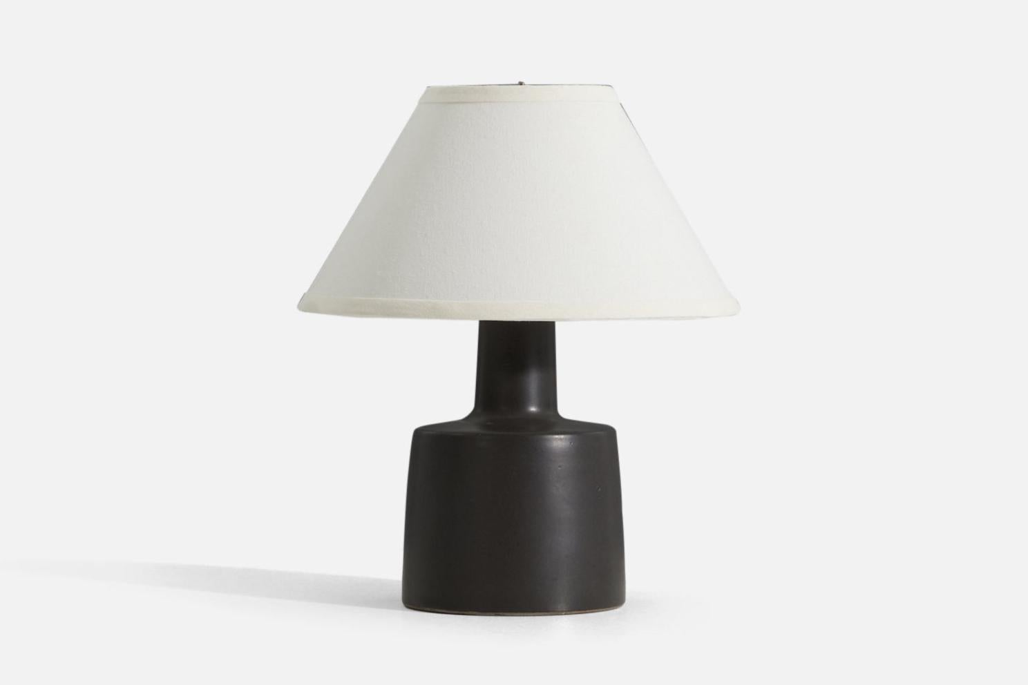 Dimensions of Lamp (inches): 12.25” H x 6.25” Diameter

Dimensions of Shade (inches): 5.25” Top Diameter x 12.25” Bottom Diameter x 7.25” H

Dimensions of Lamp with Shade (inches): 14.5” H x 12.25” Diameter

Bulb Specifications: E-26 Bulb

Number of