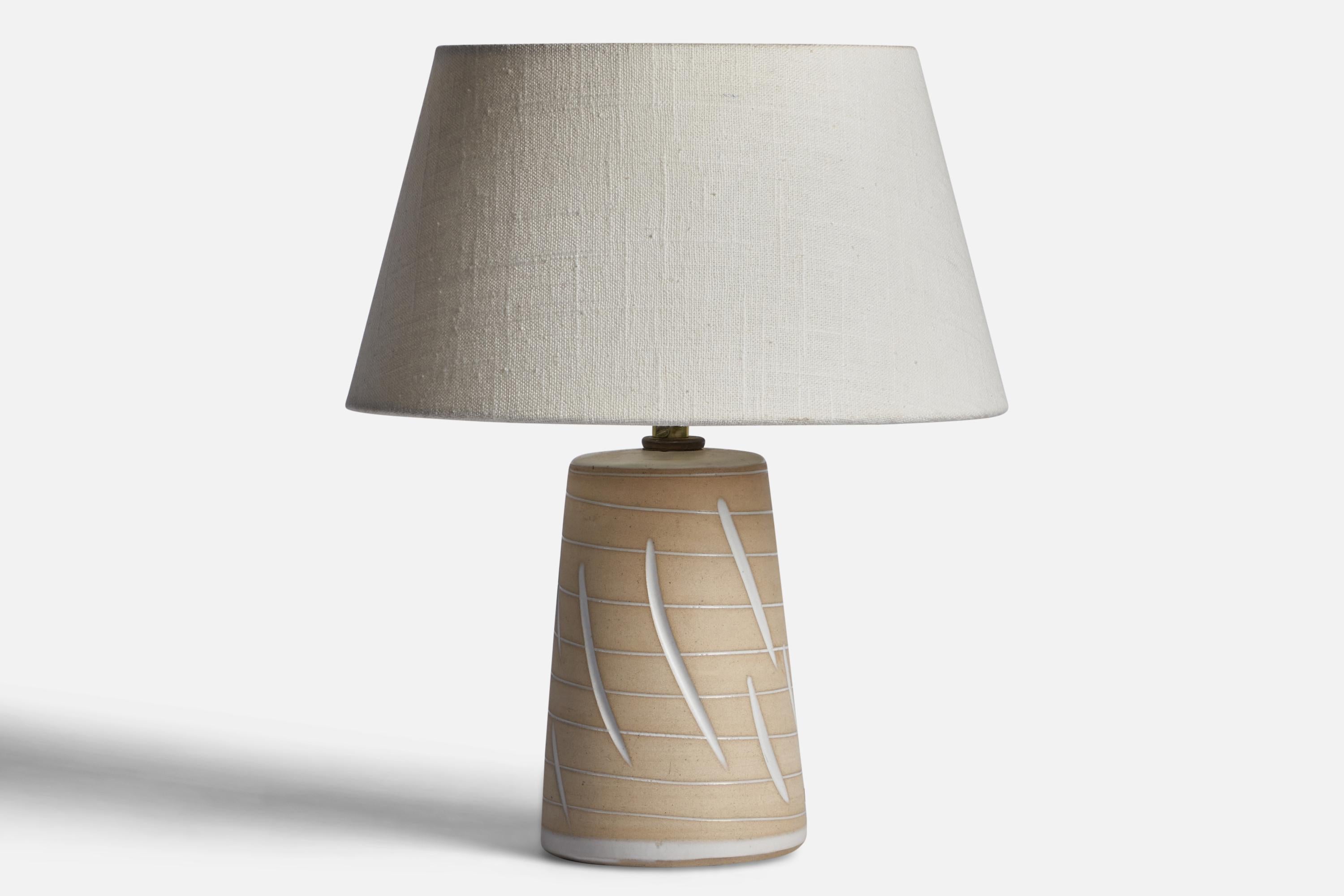 An grey-glazed ceramic table lamp designed by Jane & Gordon Martz and produced by Marshall Studios, USA, 1960s.

Dimensions of Lamp (inches): 9” H x 4.15” Diameter
Dimensions of Shade (inches): 7” Top Diameter x 10” Bottom Diameter x