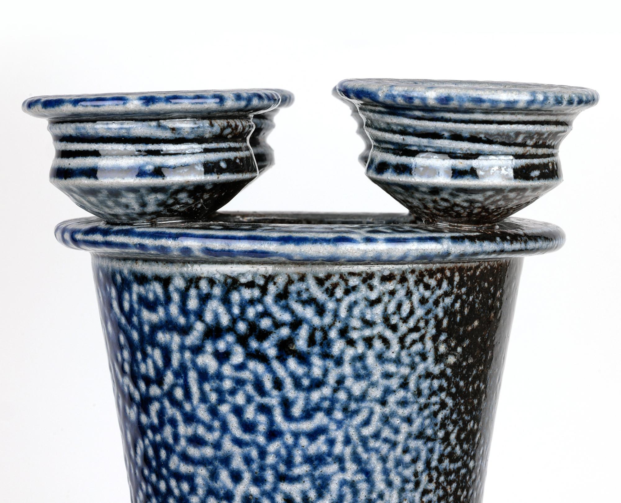 A large and exceptional vintage British studio pottery candlestand by renowned potter Jane Hamlyn and made at Millfield Pottery near Doncaster probably in the latter 20th century. The tall and heavily made candlestand stands on a wide skirted foot