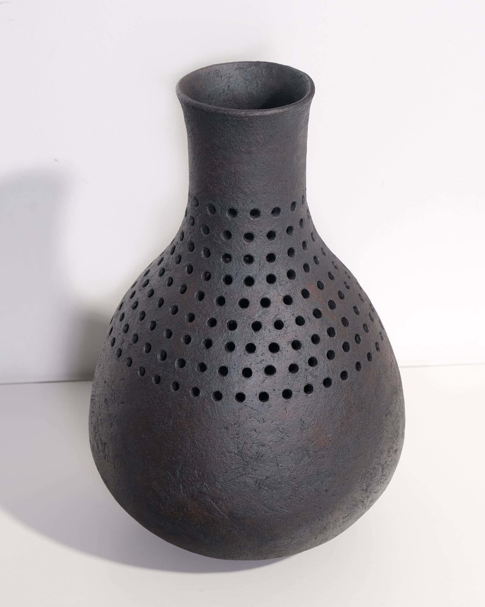 Arcilla de manivela construida a mano con óxido
H47 x D30 cm