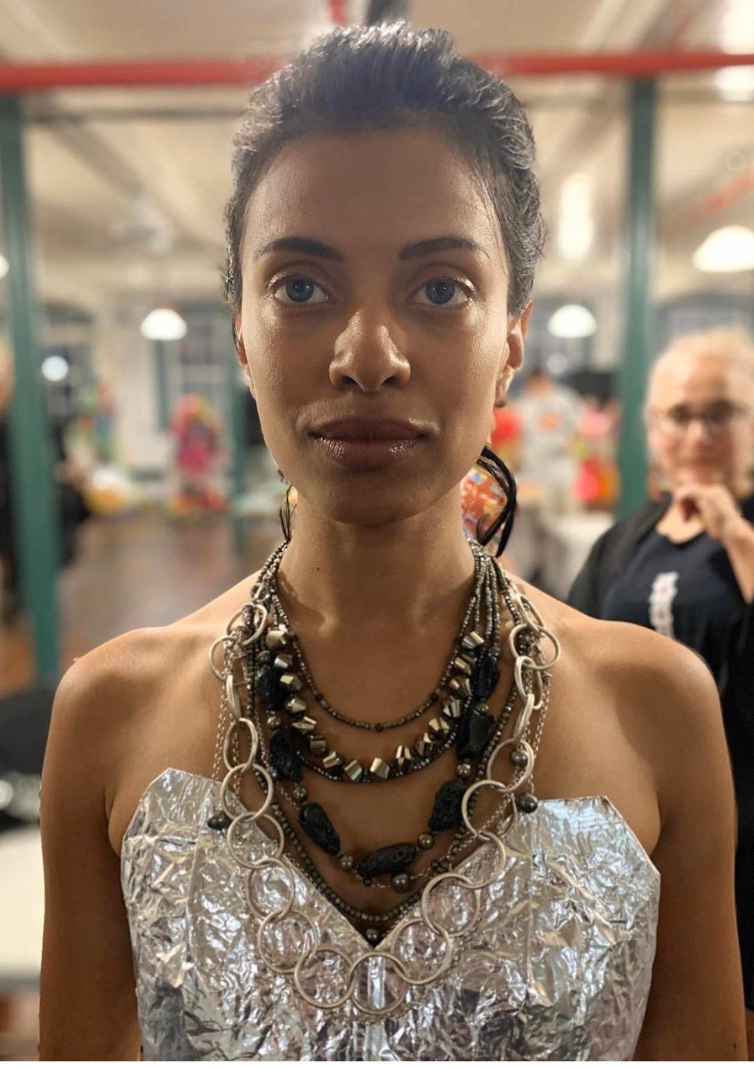 Take a glimpse into the apocalyptic world with Jane Magon Collections in this one of kind Dystopia Necklace with multiple strands of Sterling Silver Chains holding Meteorites, Pyrite, Black Fresh Water Pearls, Quartz Crystals, and Stone with a Round