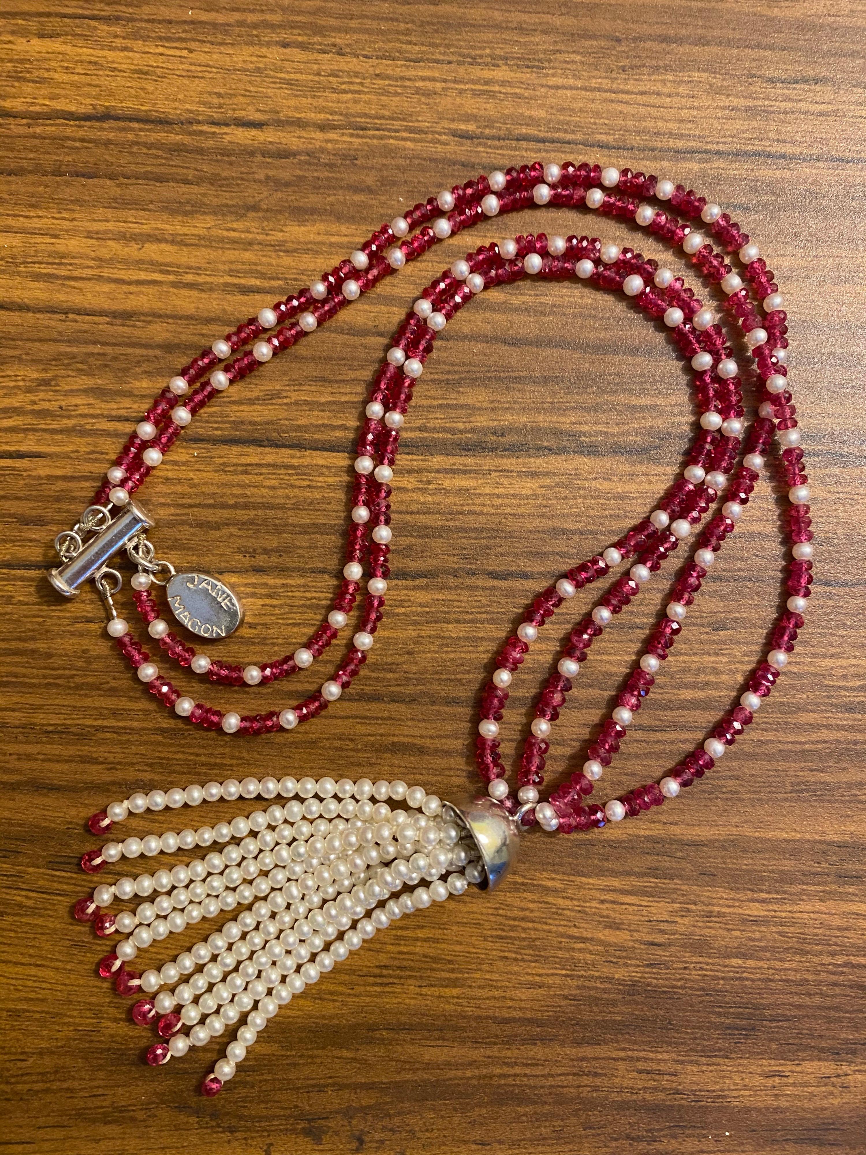 Jane Magon Collections Freshwater Pearl and Fine Red Spinel Necklace is an elegant and savvy addition to your jewelry wardrobe. Measuring 11.5 inches in length and has a Sterling Silver Clasp, Name Tag for Jane Magon, and a cap over the pearls. In