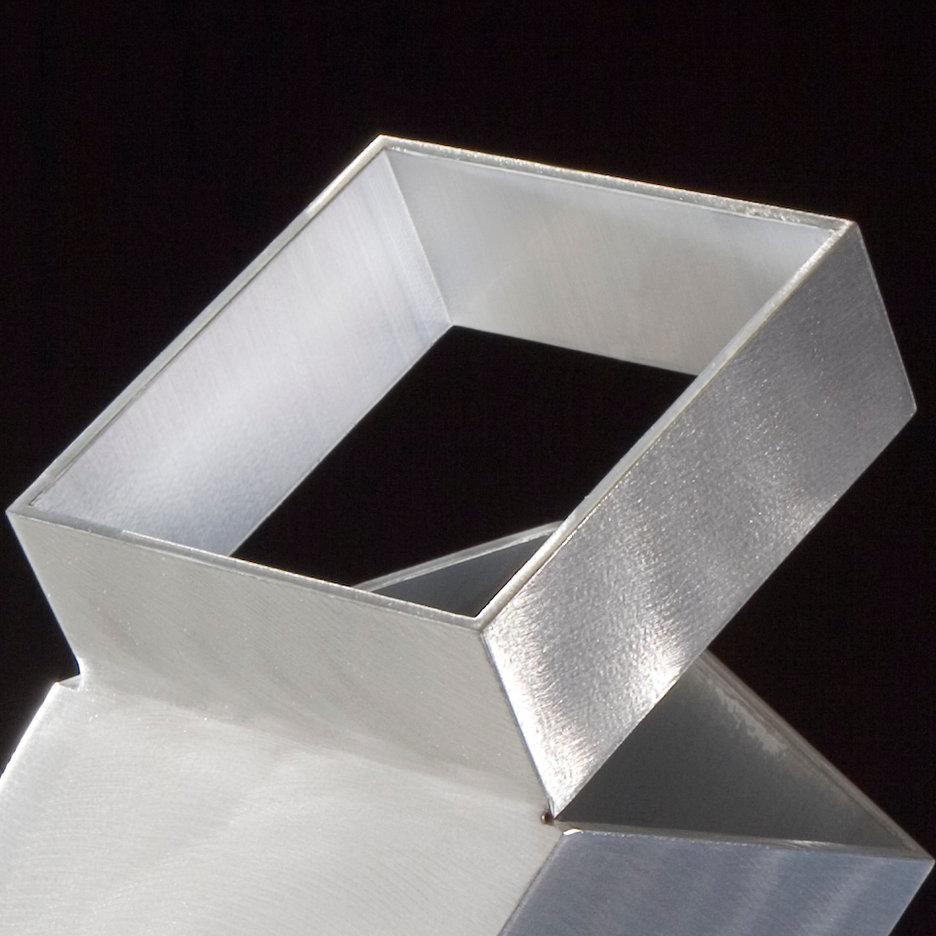 Box Trot, brushed, welded aluminum table top sculpture - Sculpture by Jane Manus