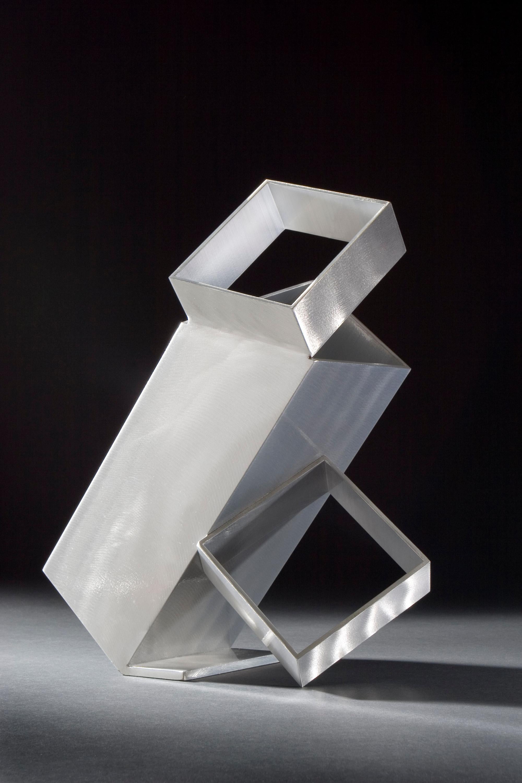 Jane Manus Abstract Sculpture - Box Trot, brushed, welded aluminum table top sculpture