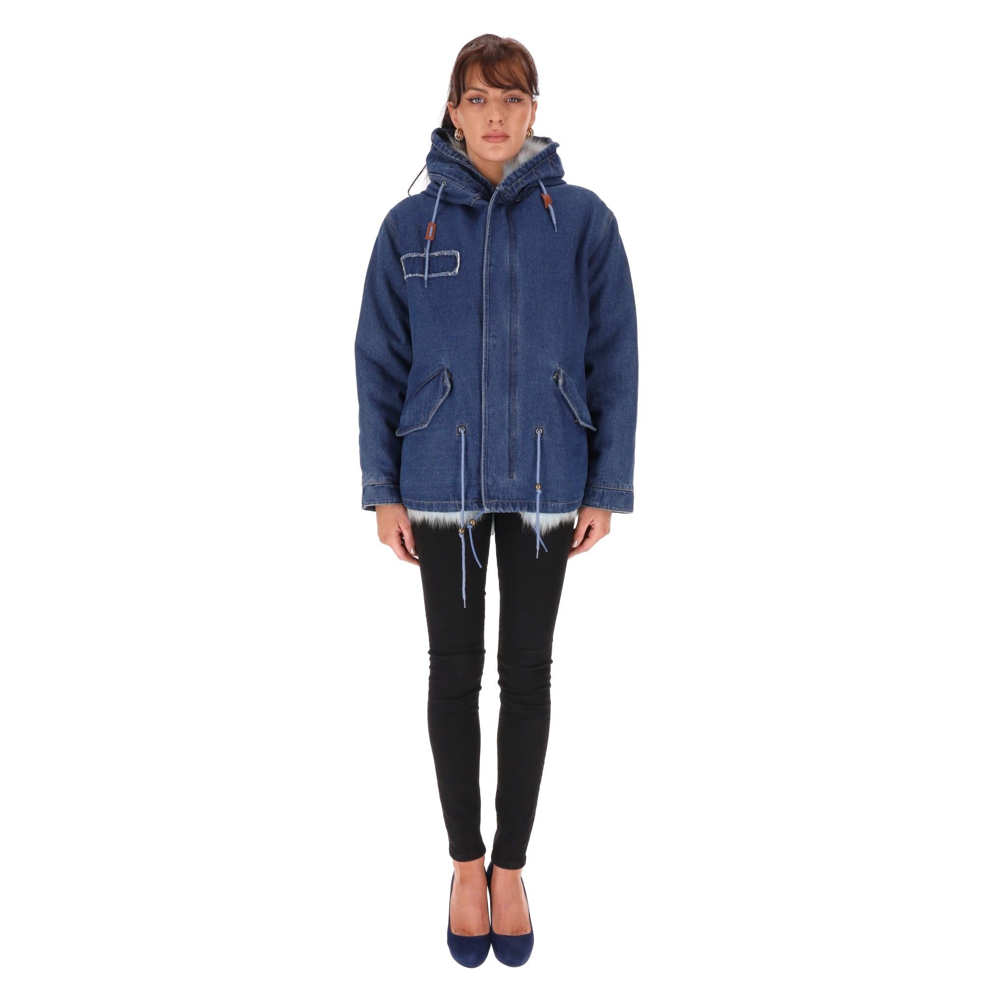Jane & Tash Denim & Fox Fur Parka Coat

Dark blue parka designed with baby blue Fox fur interior and Raccoon lined hood.

Detailed with drawstrings to the hood and waist.

Featuring flap pockets to the sides and zip and snap centre fastening.

Rrp