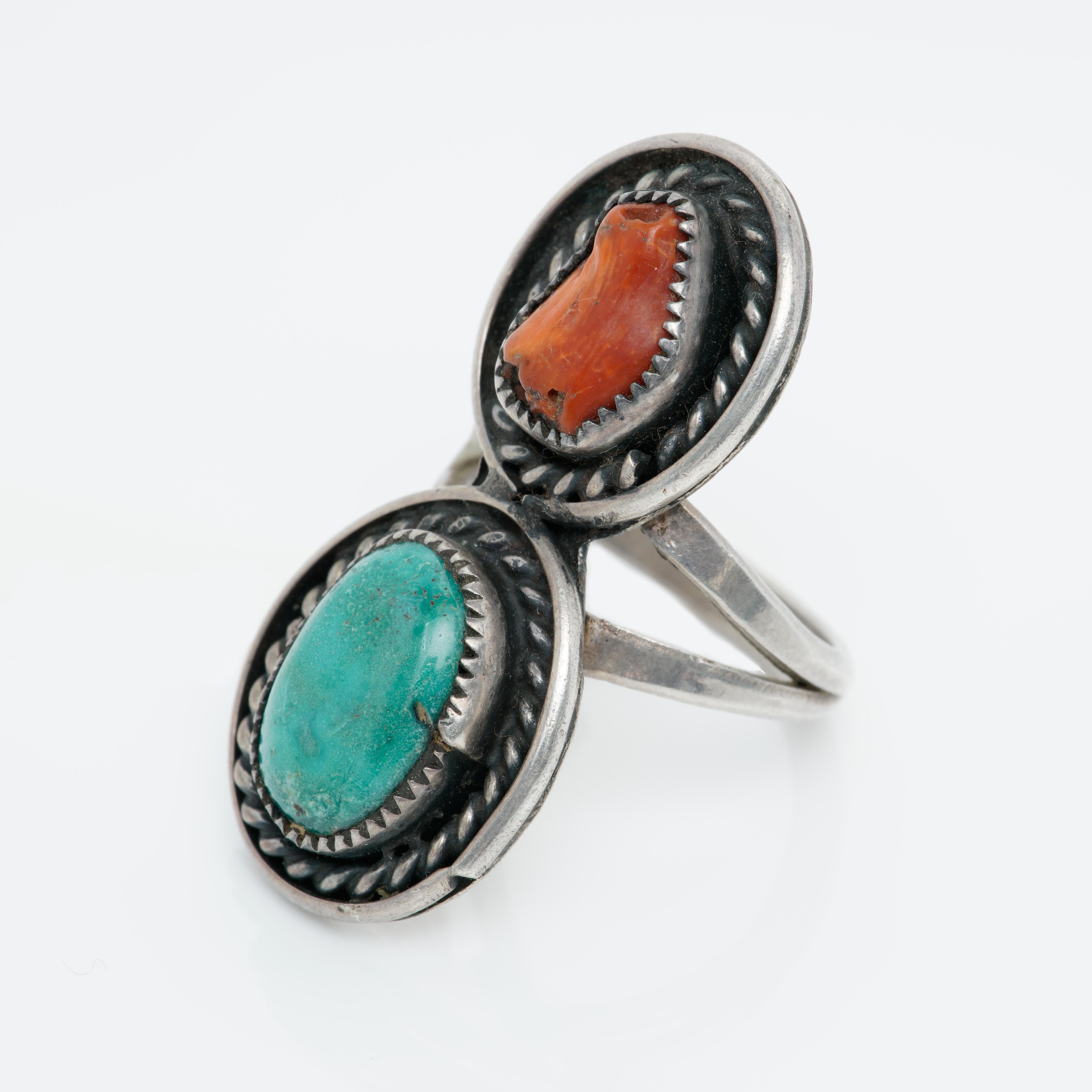 Signed Jane Yikaazba Popovitch Native American Silver, Coral and Turquoise Ring c. 1970s

Hand-forged and hand-engraved Sterling Silver, Natural Coral Branch and Turquoise, beautiful detail and twisted rope design surrounds the stones.

Size: US