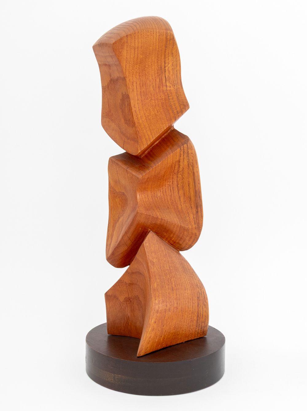 Janet Handler (American, XX-XXI) Abstract Carved Wood Sculptures, each on wood base, the textured sculpture with artist label to underside.

Larger overall: 22.75
