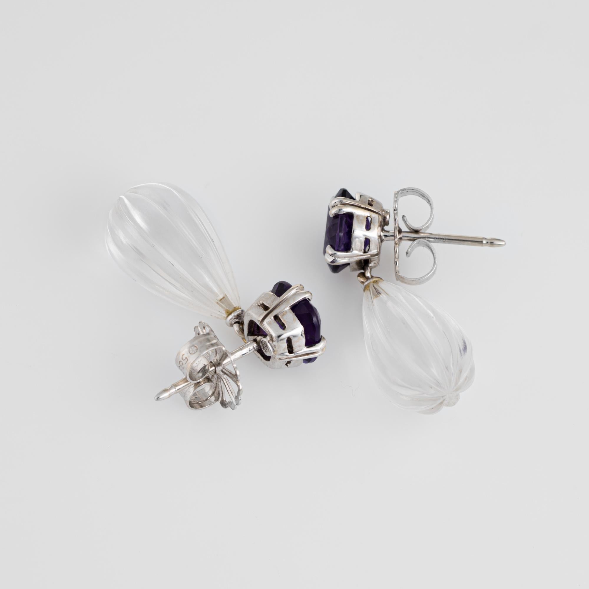 Elegant pair of Janet Mavec amethyst & rock crystal earrings crafted in 18k white gold. 

Cushion cut amethysts each measure 8mm (estimated at 2 carats each - 4 carats total estimated weight), accented with fluted rock crystal that measures 15mm x