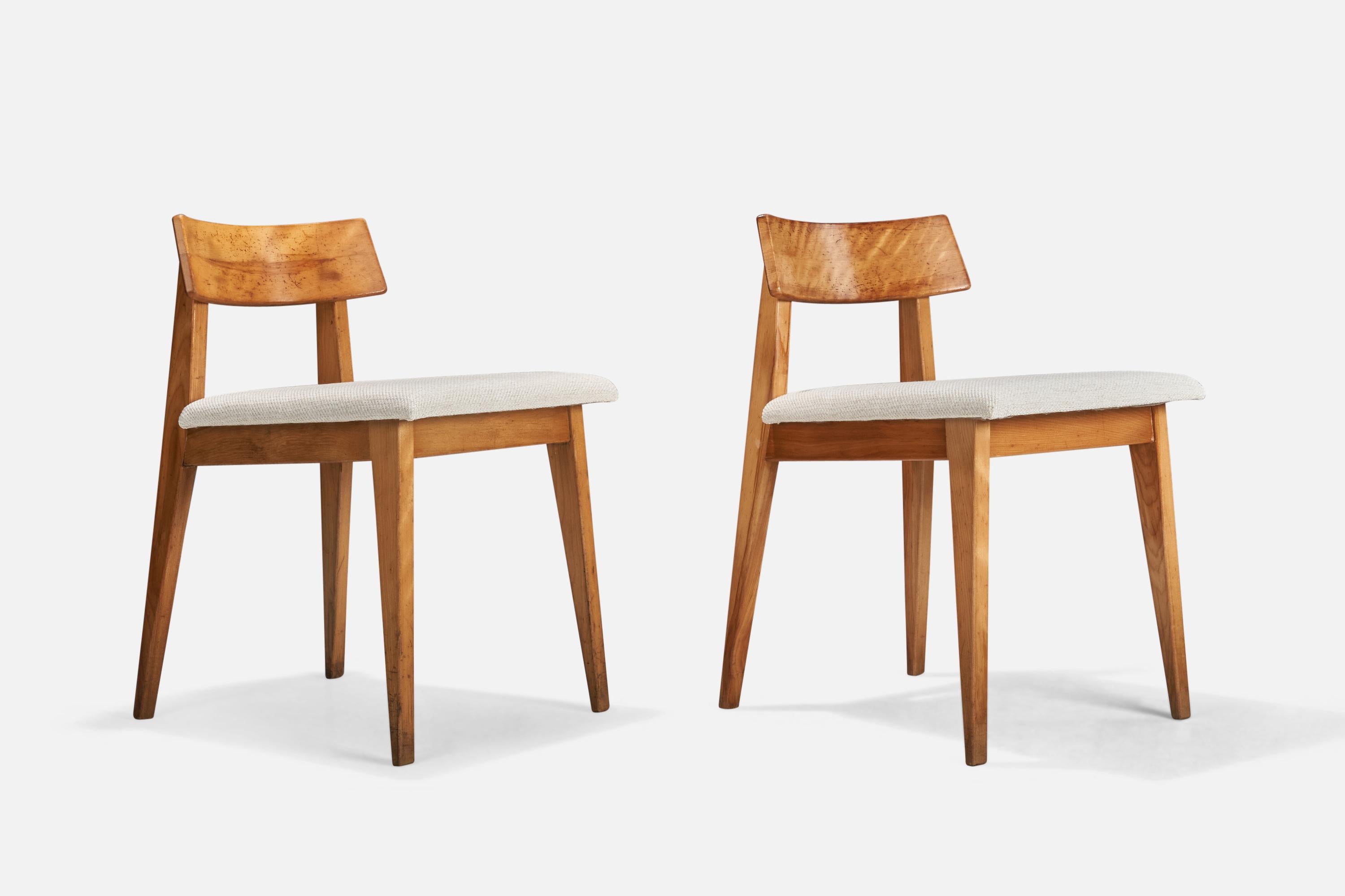 A pair of wood and fabric side chairs designed by Janet Rosenblum produced in New York, USA, 1950s.