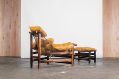 Fauteuil et tabouret Jangada en cuir - Jean Gillon, mi-siècle moderne