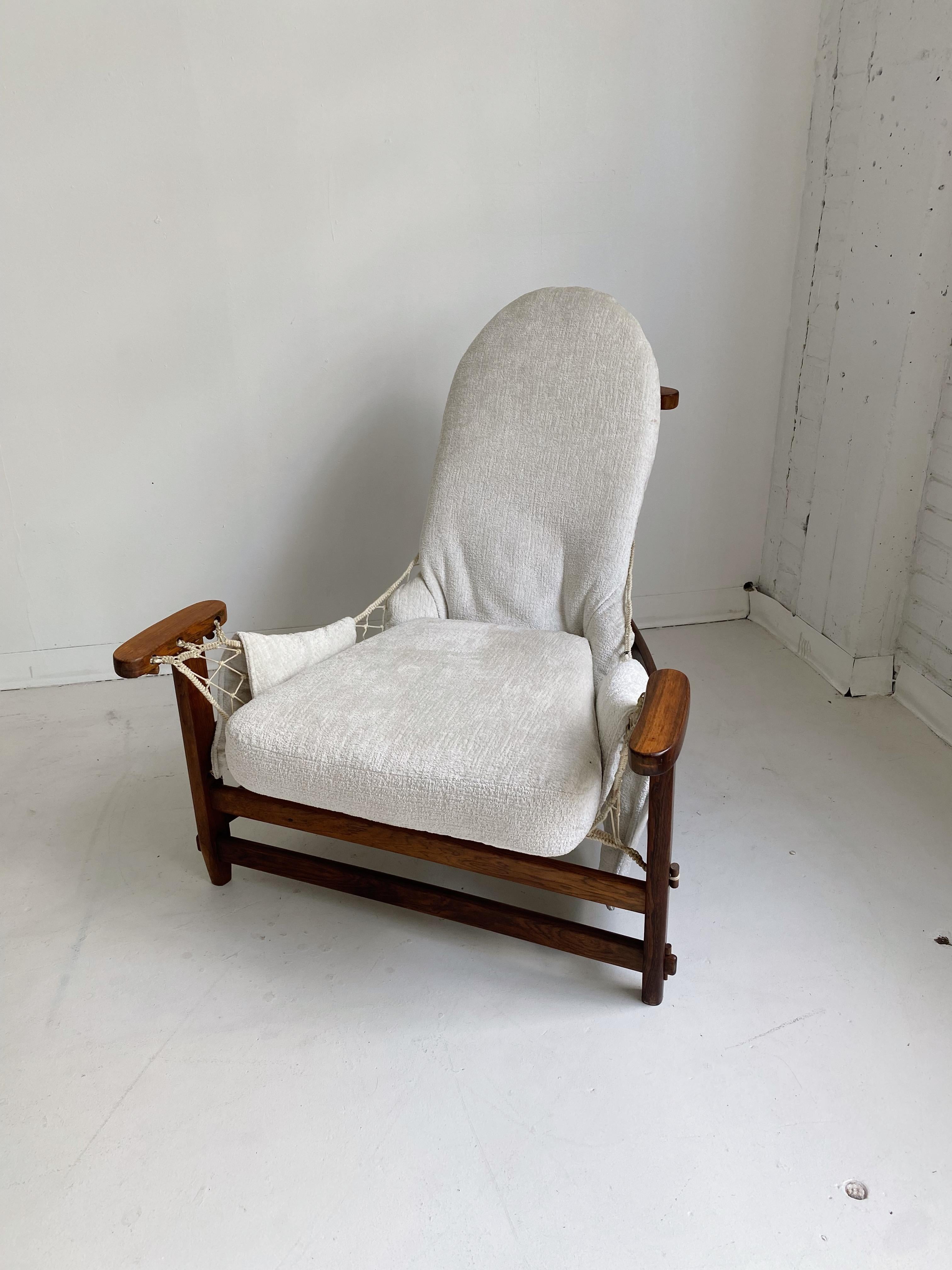 Vintage Jangada lounge chair by Jean Gillon, 60's.

Features a jacaranda frame, hammock like base made of nylon ropes. Reupholstered for extra comfort with added cushions and chenille fabric.

Original style leather upholstery can be provided for