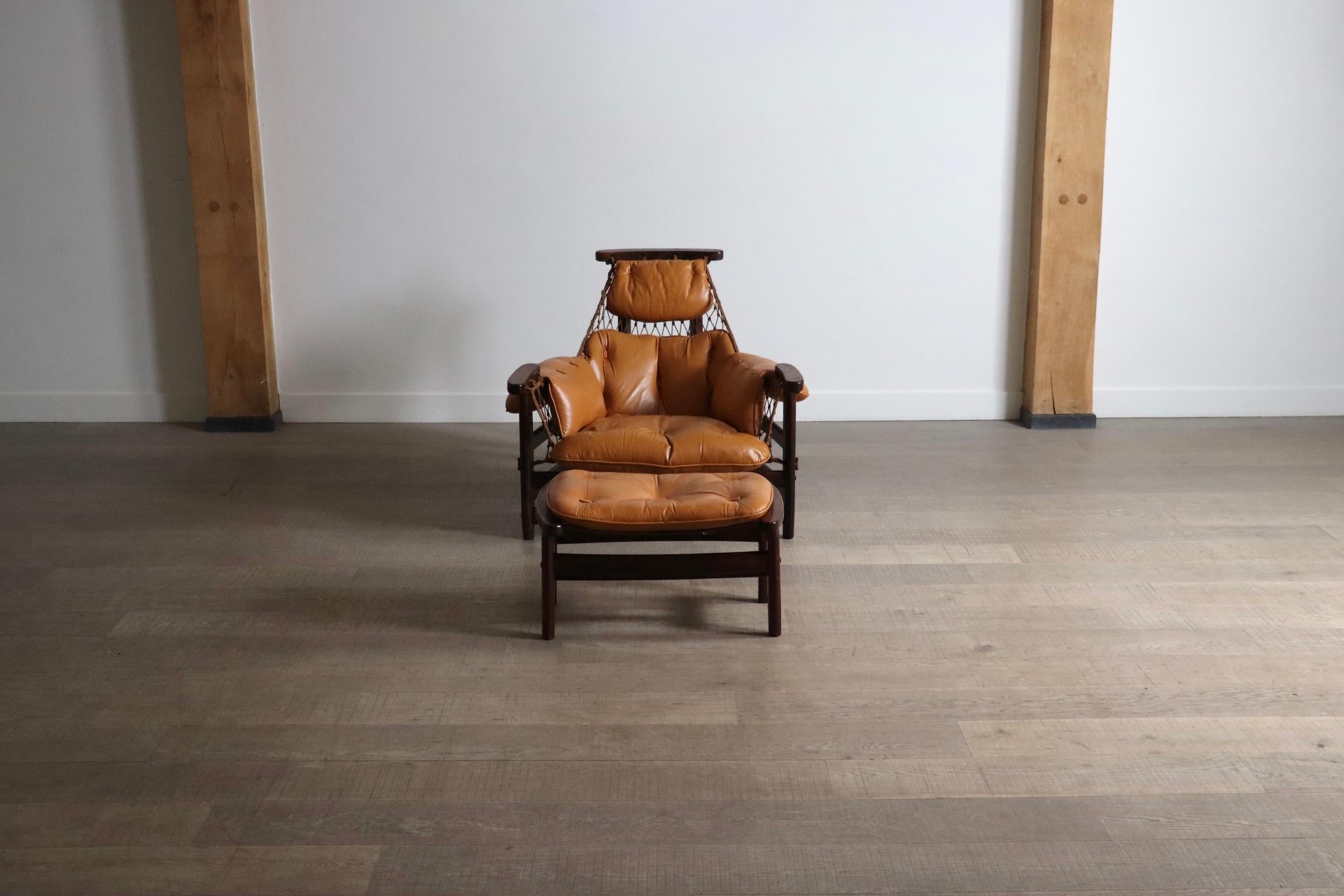 Jangada Lounge Chair with ottoman in cognac leather by Jean Gillon, Brazil 1960s

A breathtaking design inspired by the markets and fishermen of Brazil, is often seen and referred to as Jean Gillon’s most celebrated work. The Jangada chair is made
