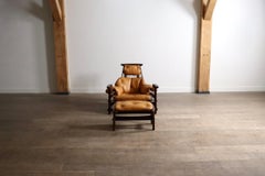 Sillón Jangada con otomana en cuero coñac de Jean Gillon Brasil Años 60