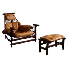 Sillón Jangada con otomana en cuero coñac de Jean Gillon Brasil Años 60