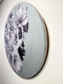 "Floral Whisperer" Side profile of Black woman with flower crown and tribal mark