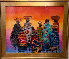 "Sunset Soiree, a Sunset Walk" woman donning baskets walking into sunset