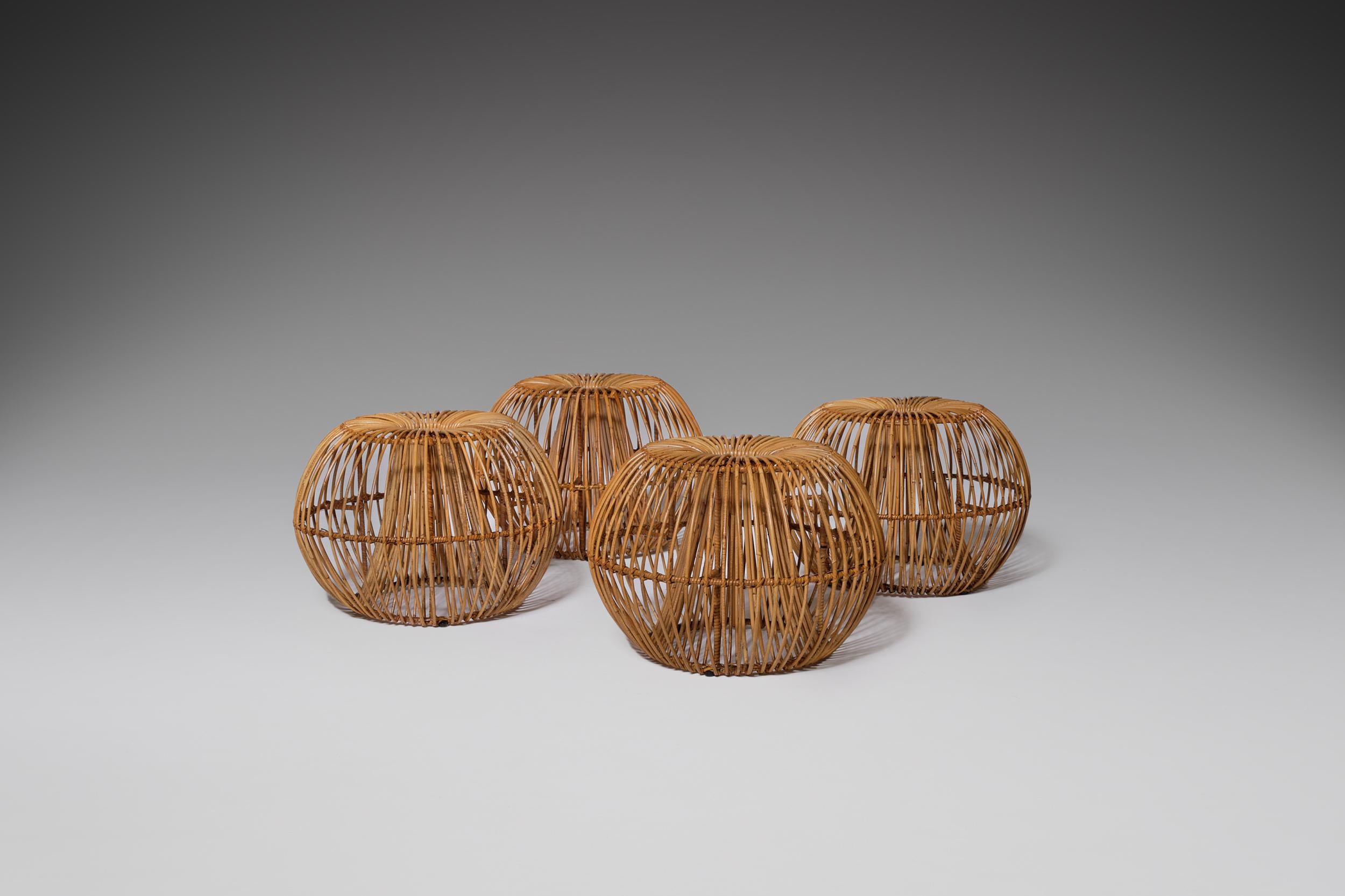 Exceptional set of rattan stools by Janine Abraham and Dirk Jan Rol for Rougier, France, circa 1955. Fantastic Mid-Century Modern basket shaped stools / ottomans made of rattan and a metal frame inside to provide it's strength. High quality