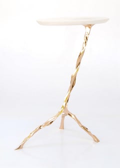 Tavolino Janis con piano in onice di Fakasaka Design