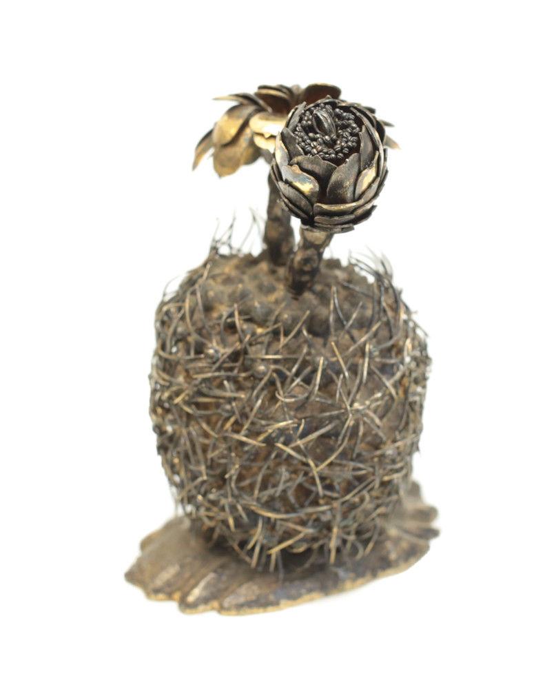 Janna Thomas De Velarde for Tiffany & Co. gilt sterling silver barrel cactus sculpture, circa 1970. Tiffany & Co. marks to the underside base. Made in Mexico. Weight Approx., 29.84 ozt 


Measures: Approx., 3.5