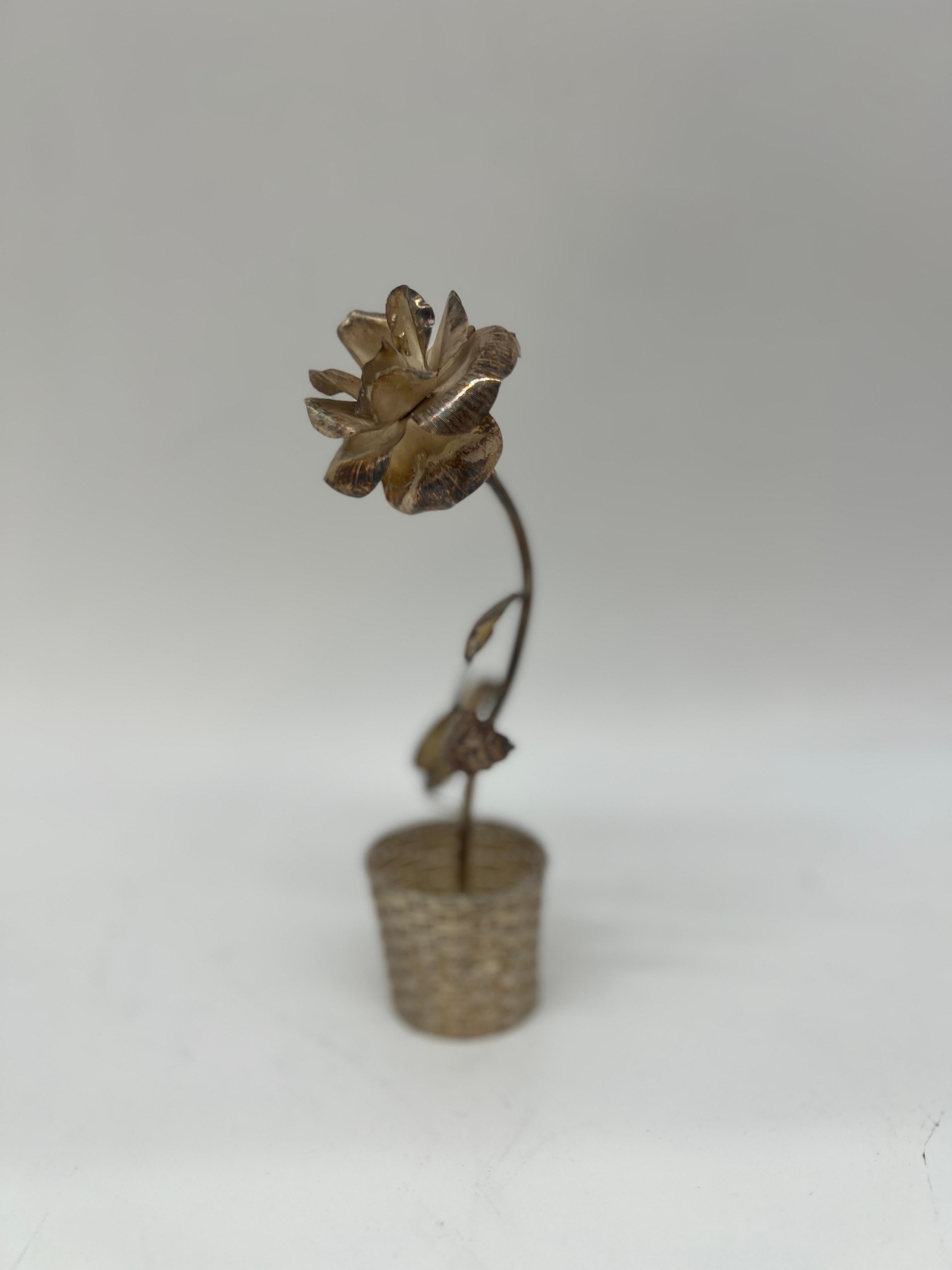 Mexico, 20th century. 

Style of Janna Thomas. A Sterling Silver rose in a pot - marked to underside.