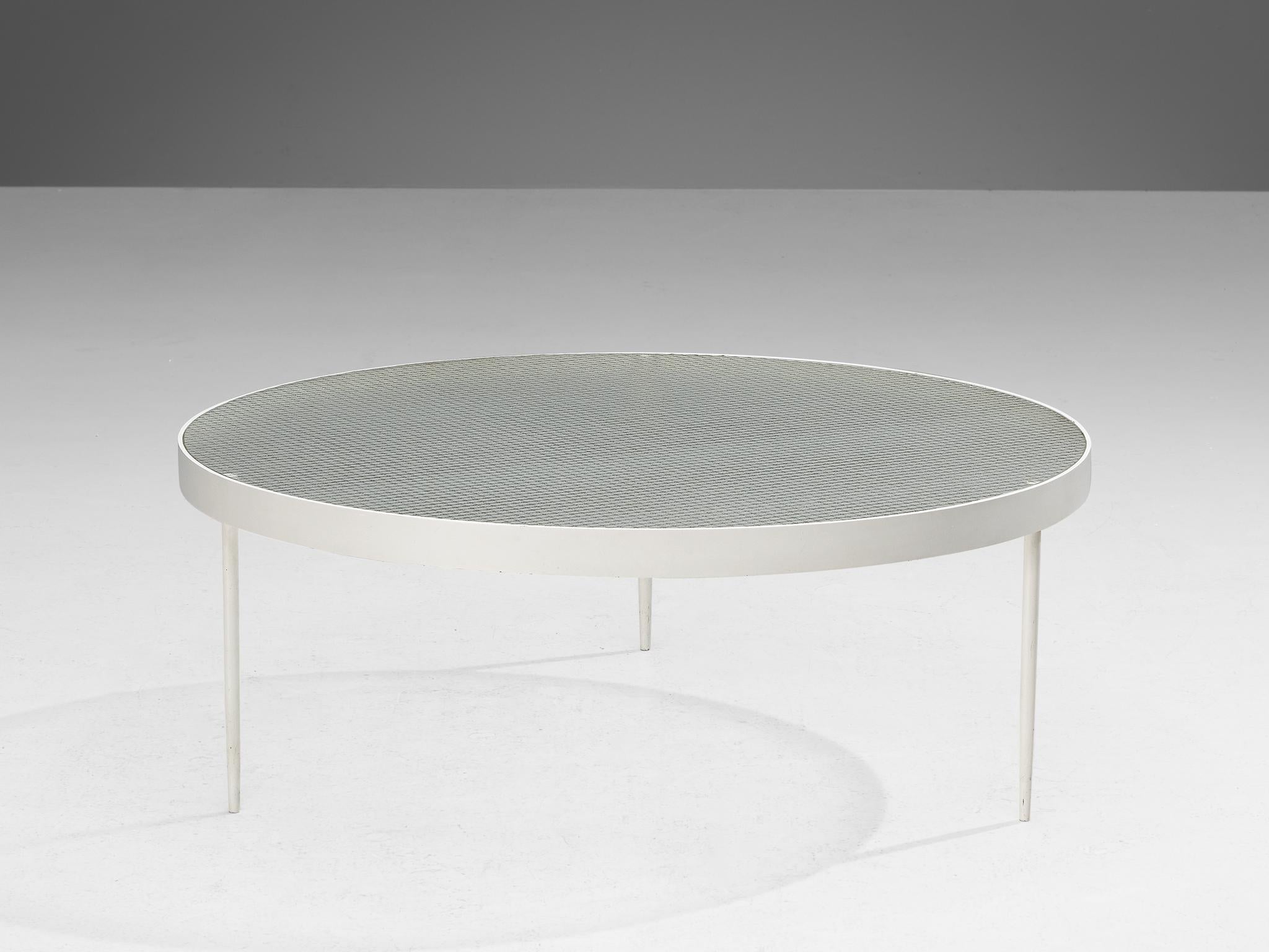 Janni Van Pelt, 'G4' coffee table, wired glass, white lacquered metal, Netherlands, design 1958

Round coffee table in white coated metal and clear wired glass. This table is a variation on Janni Van Pelts model G4, of which there are multiple. The