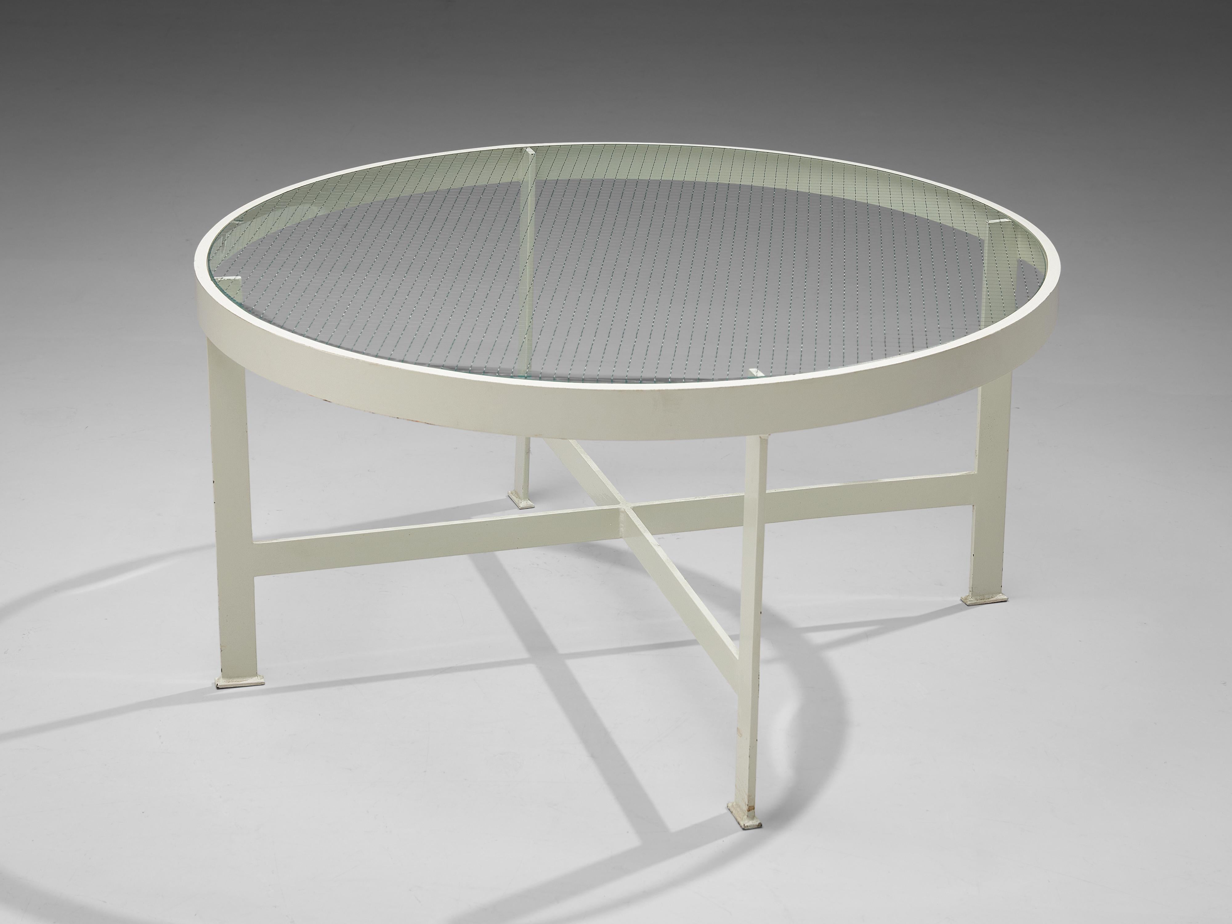 Janni Van Pelt, coffee table, glass and white metal, the Netherlands, circa 1958.

Round coffee table in white coated metal and glass designed by Janni van Pelt. This table is a variation on model G4. The base consists of four legs with a