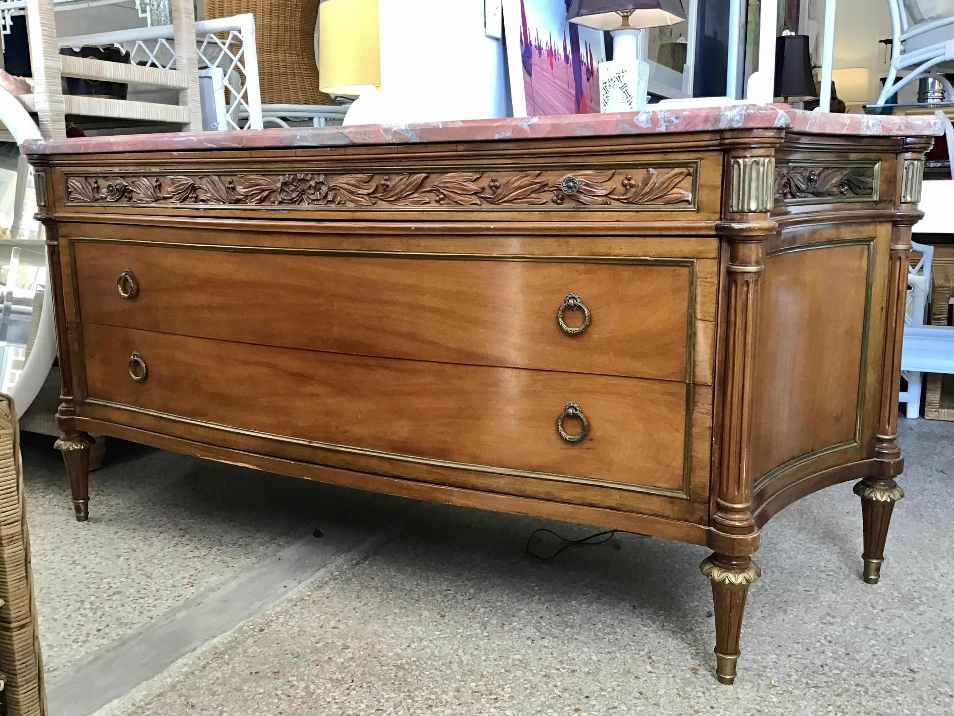 Wonderful French Jansen commode with marble top. This is unusually large and most likely custom made at 75