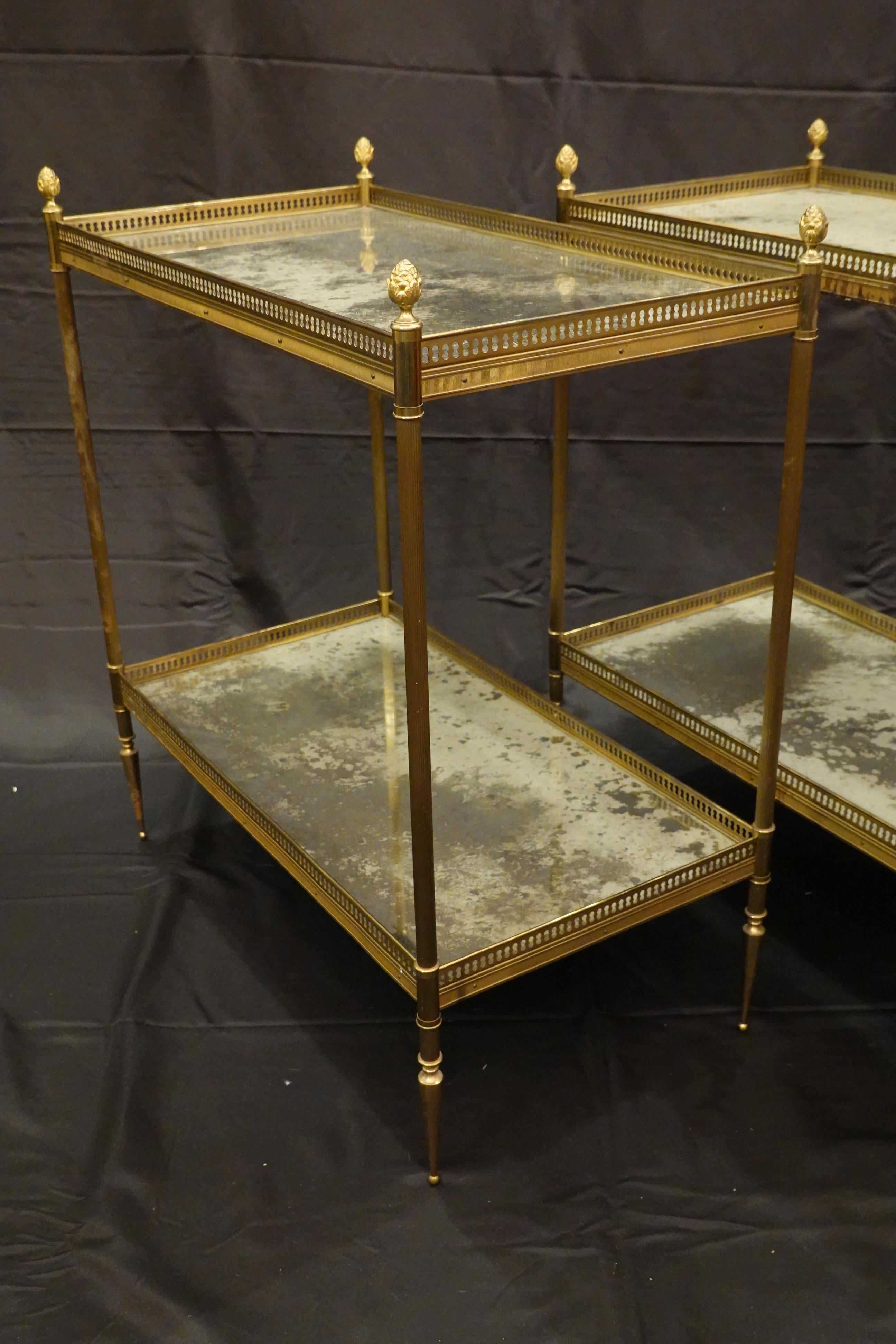 Jansen Neoclassical Brass Two-Tiered Side Tables with Églomisé Tops In Good Condition In Pembroke, MA