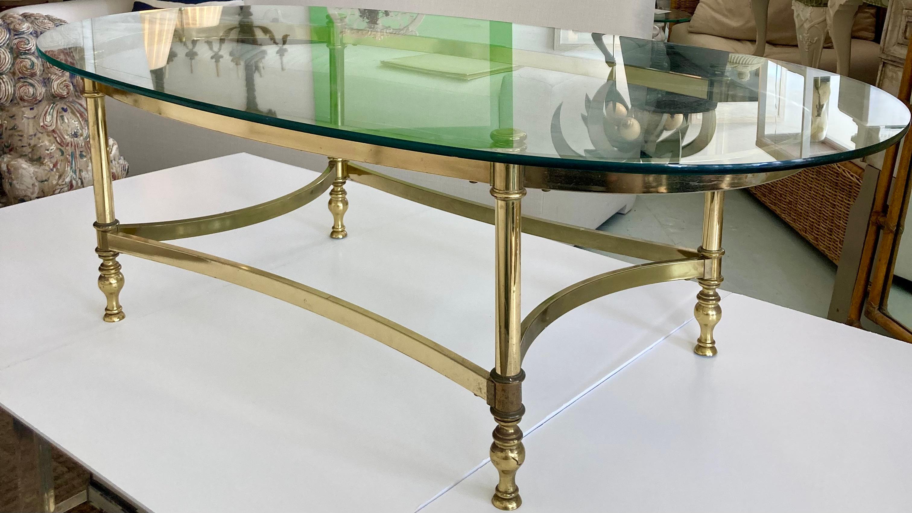 French Jansen Oval Glass Top Coffee Table With Brass Metal Frame