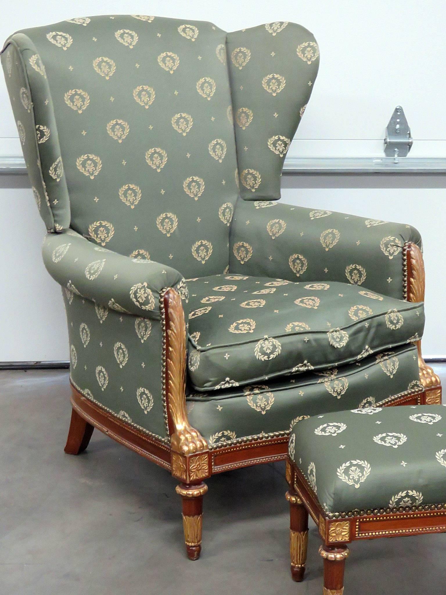 Jansen Regency style chair and ottoman. Nailhead trim with gilt decor. Measures: 18.5