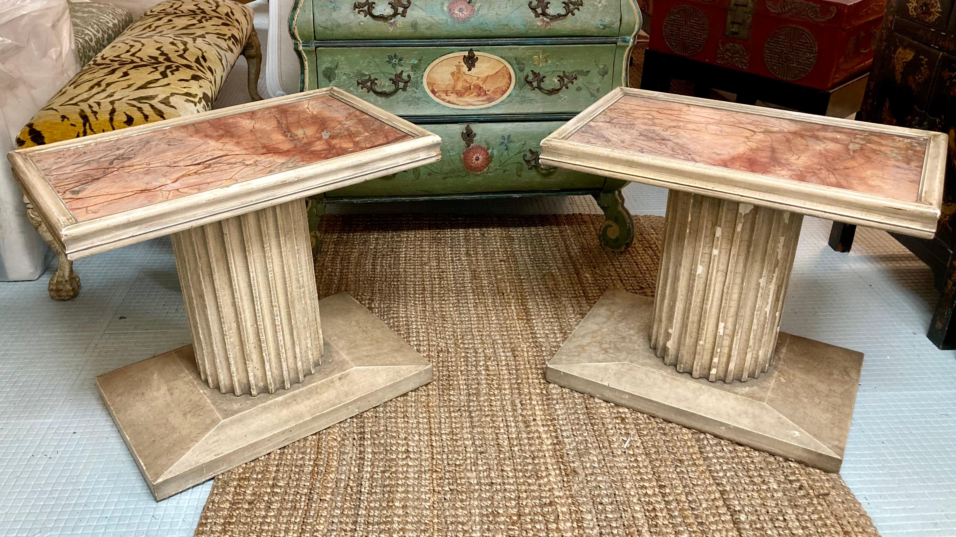 Beautiful pair of Jansen side tables with marble inset tops. The finish is original showing some age that adds to the character. The stylish Neoclassical architectural for is well balanced and gorgeous. Add some French style to your home.
