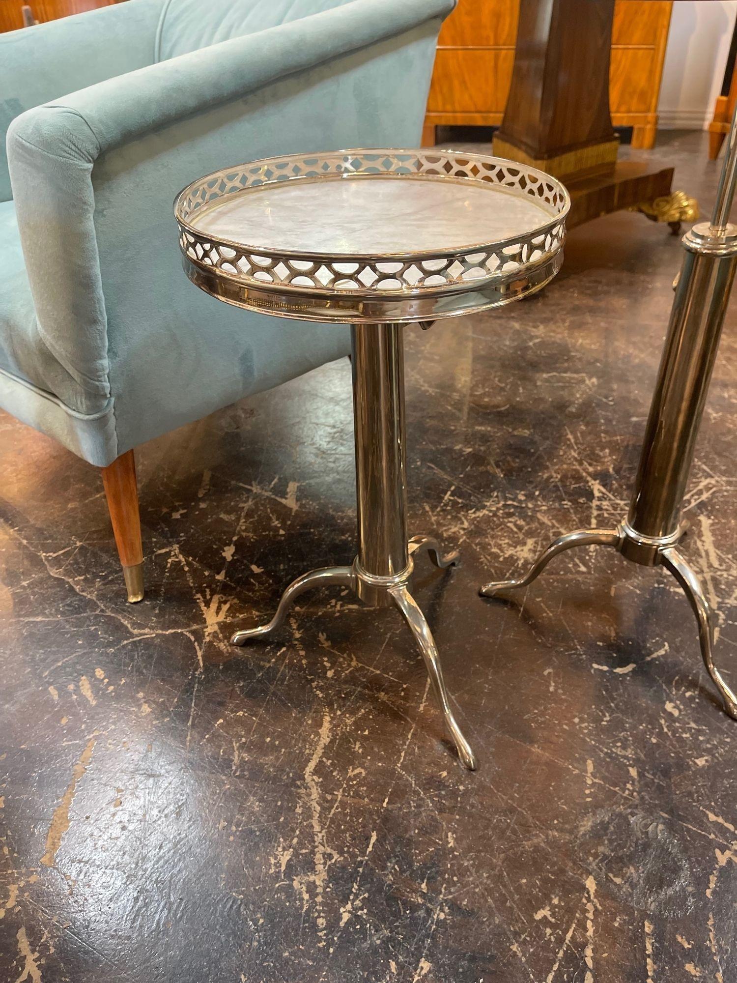 Great quality Italian Jansen style chrome and Carrara marble adjustable drink tables. Circa 1960. A fine addition to any home! 20-27 inches tall. Note: These are sold as each.