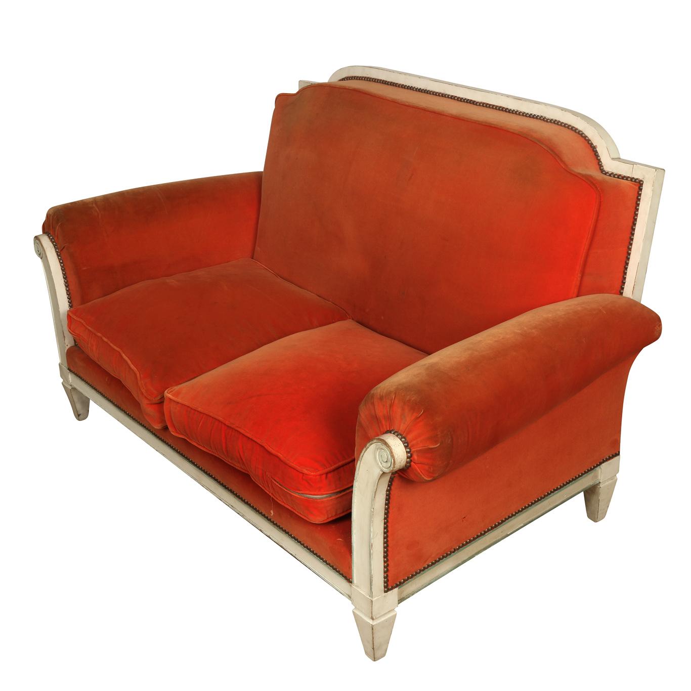 Jansen style loveseat with frame painted white, circa 1940. Shaped with curved arms, tight back and two seat cushions.