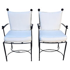 Janus et Cie Fauteuils Amalfi une paire Style Salterini