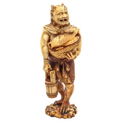 JAPAN 1880 Meiji Signed Okimono Sculpture Of ONI Demon Holding Basket With Fish