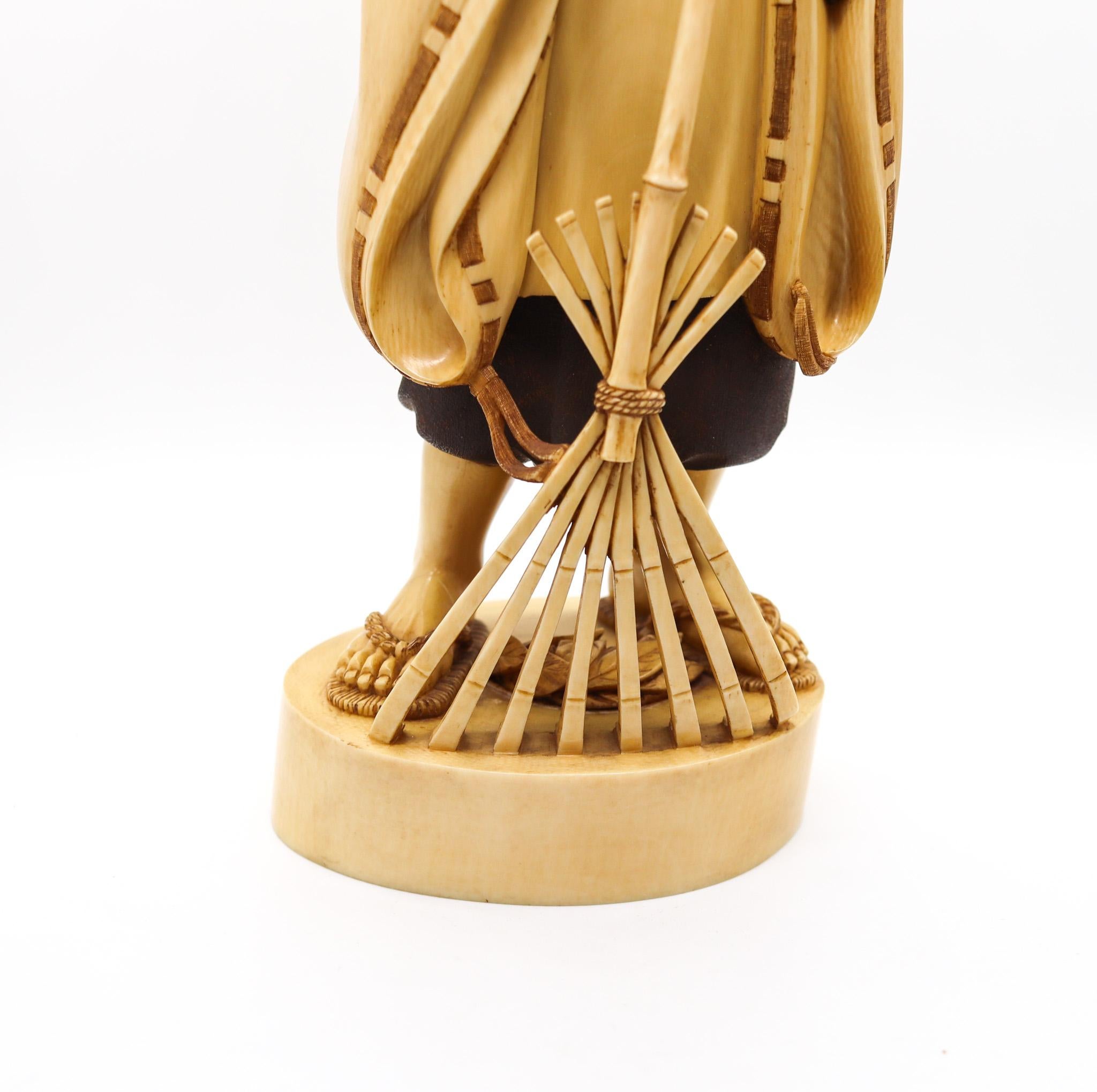 A Japanese carved sculpture of a monk.

An outstanding antique tall sculpture, created in Japan during the Meiji period, circa 1890. The carving depicts the figure of a Japanese standing and dressed monk, with an eight-toothed rake. Most probably