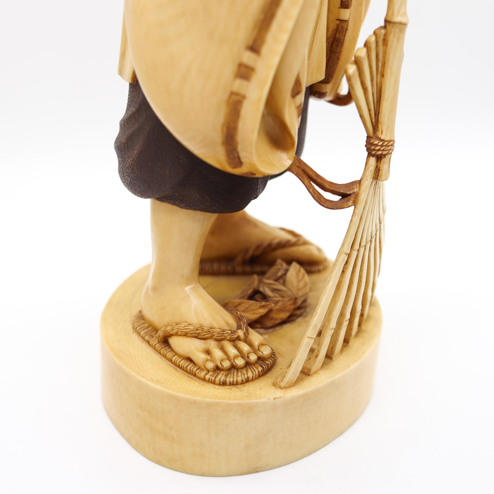 Japan 1890 Meiji Carved Sculpture of a Dressed Monk With a Rake 1