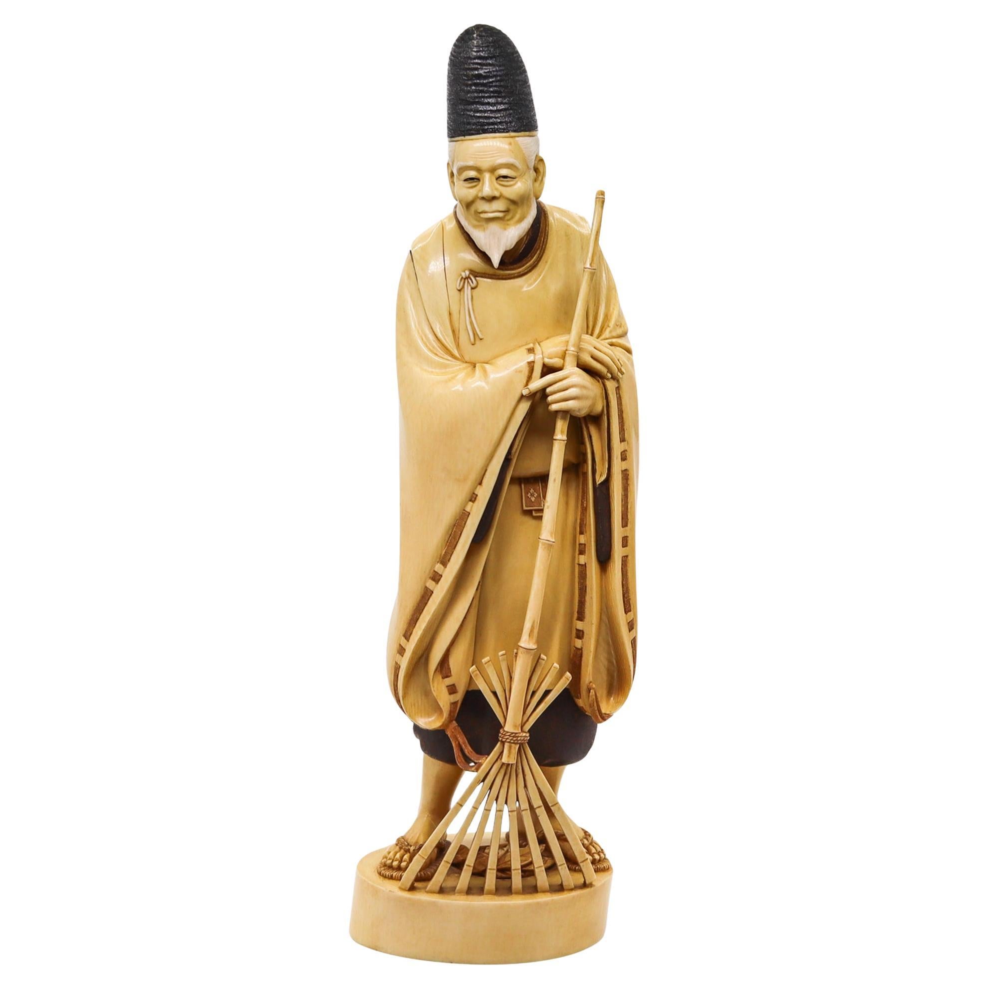 Japan 1890 Meiji Carved Sculpture of a Dressed Monk With a Rake