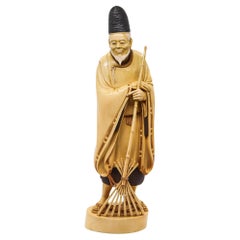 Antique Japan 1890 Meiji Carved Sculpture of a Dressed Monk With a Rake