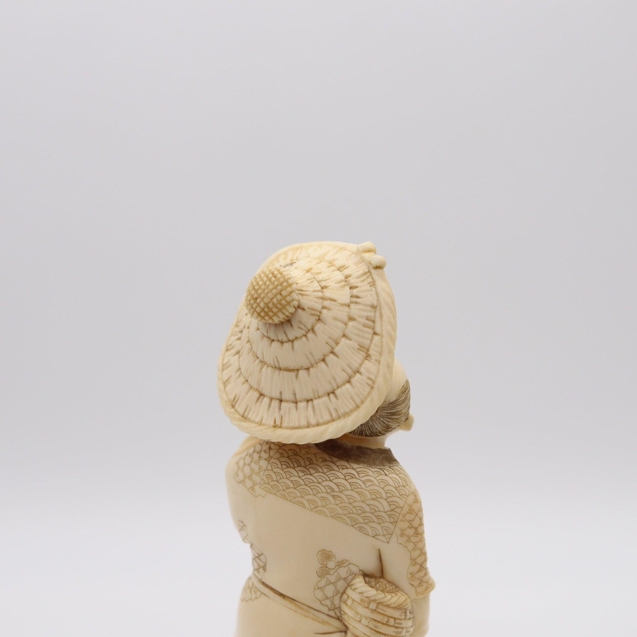 JAPAN 1895 Meiji Okimono Sculpture of a Daikoku Carved In Ivory In Excellent Condition In Miami, FL