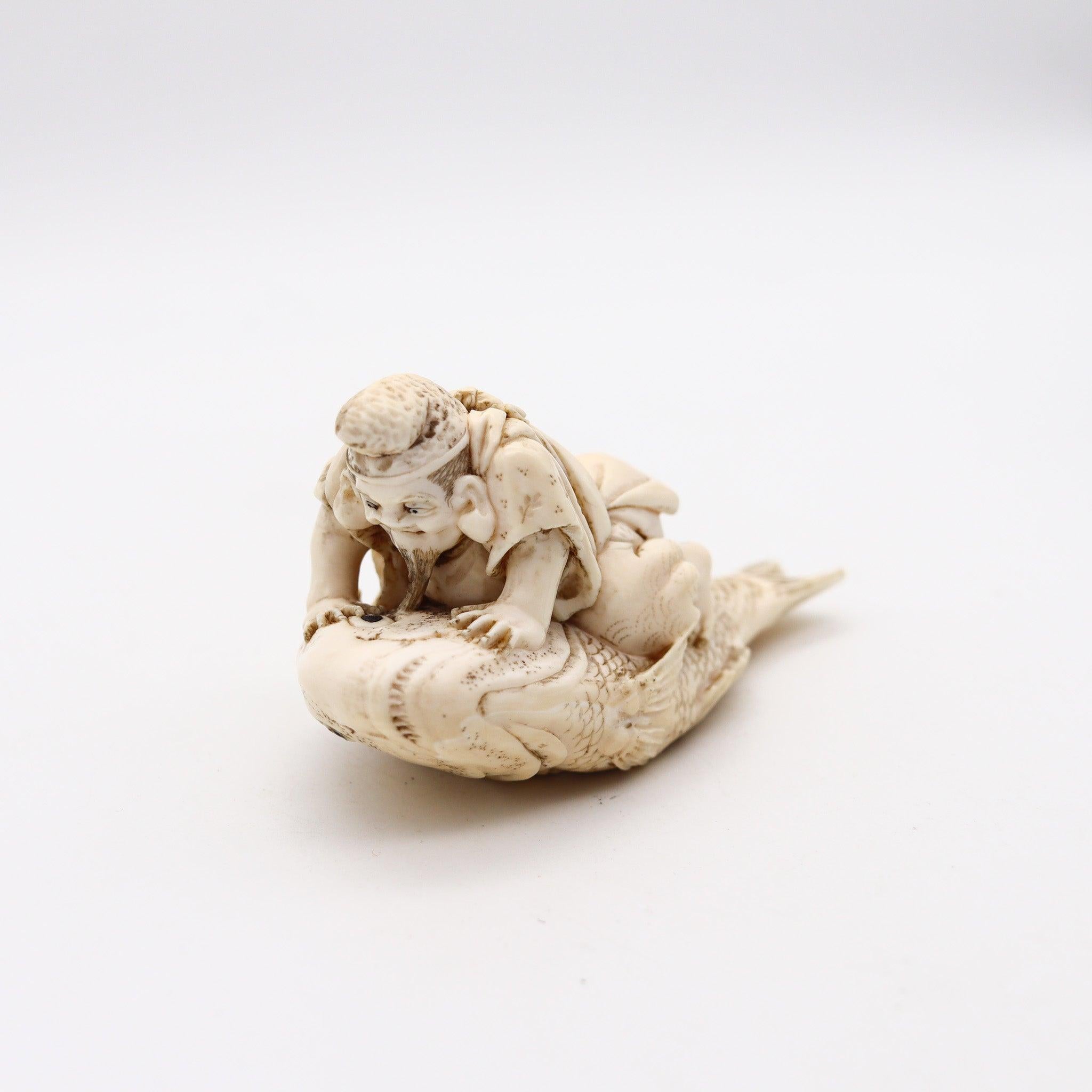 Japanese Meiji period okimono of Kinko.

This is a beautiful okimono figure, created in imperial Japan during the Meiji period, back in he 1910. The okimono sculpture has been carefully carved in ivory depicting the figure of Kinko Sennin dressed