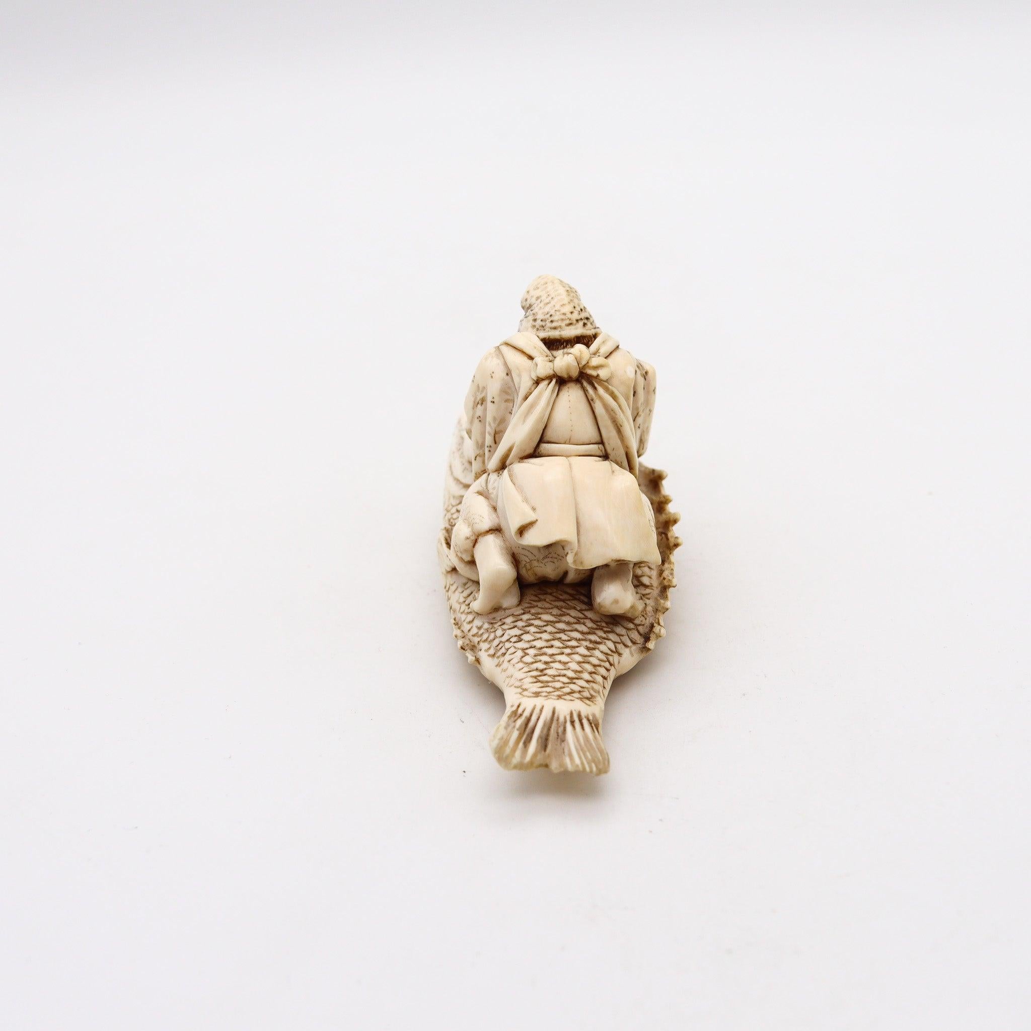 Japanese JAPAN 1910 Meiji Okimono Sculpture of Kinko Sennin On a Carp Carved In Ivory