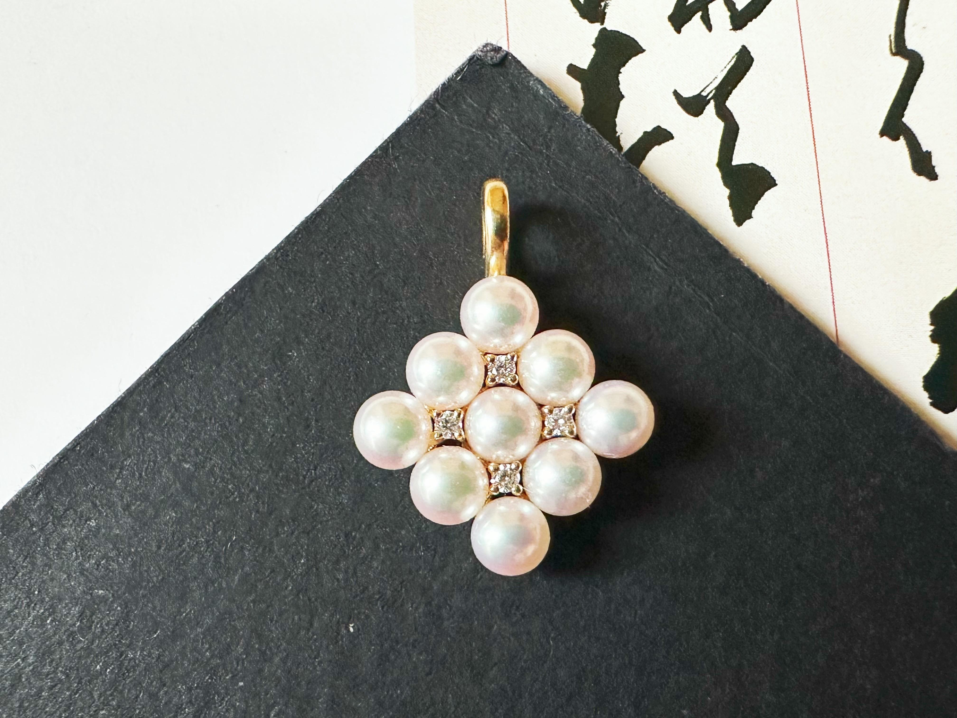 Elevate your style with this stunning handmade pendant, featuring ethically sourced Akoya pearls from Japan and shimmering diamonds set in 18k gold. Expertly crafted with meticulous attention to detail, it radiates an elegant, one-of-a-kind
