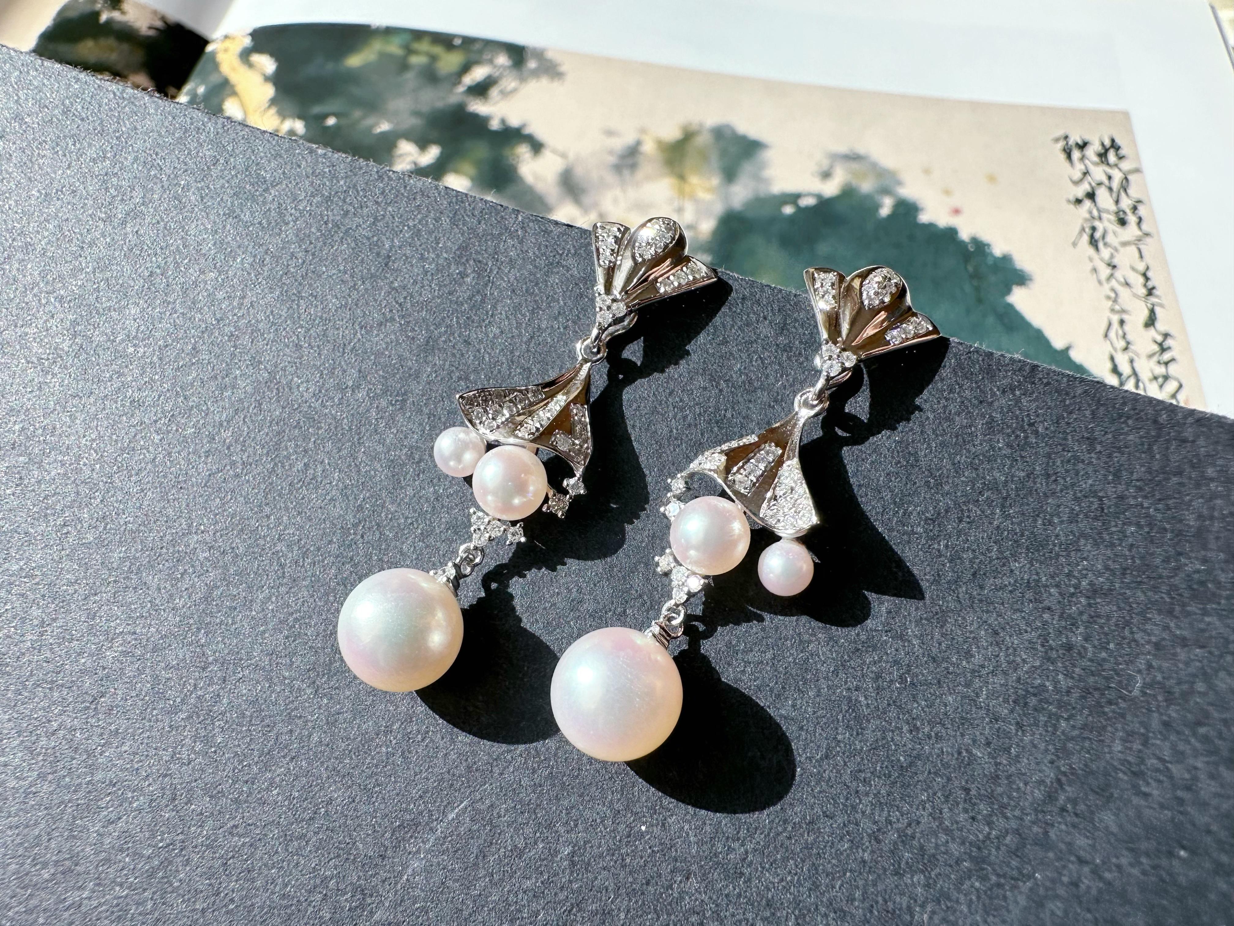Introducing our elegant long earrings featuring six natural Japanese Akoya pearls beautifully set in 18K white gold with diamond. These versatile earrings offer multiple ways to wear them, and a removable pearl at the bottom allows for a