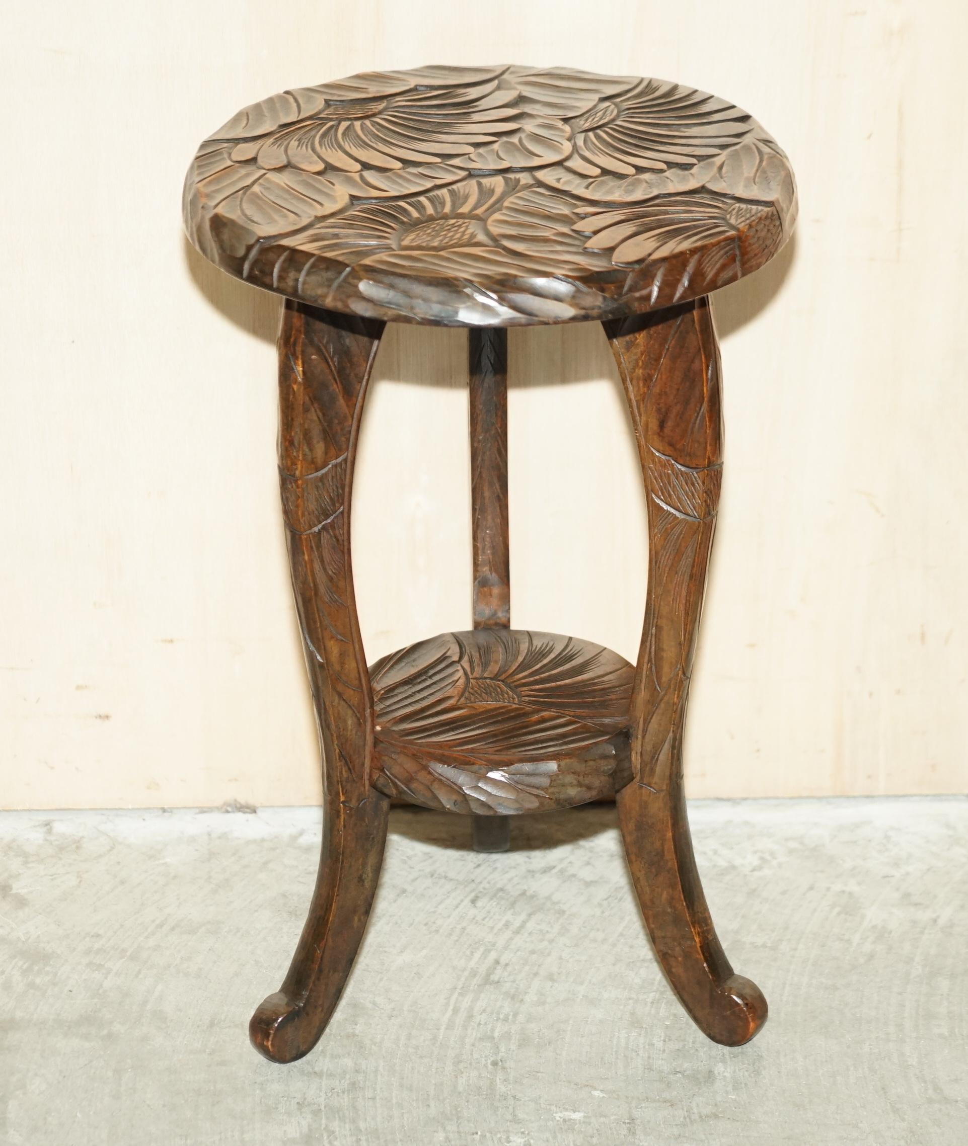 We are delighted to offer for sale this lovely Liberty’s London Japan1905 oriental mahogany side table.

A good-looking piece, its hand carved from top to bottom with floral detailing, I have variations of these types of tables and one very rare