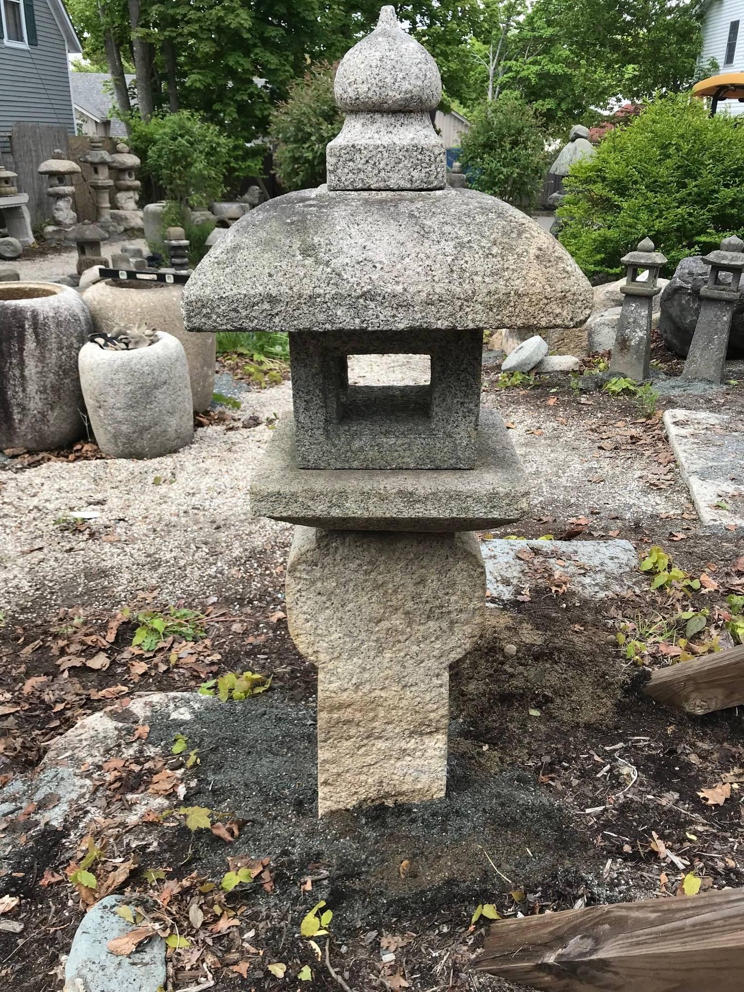 Japan “Oribe” granite stone lantern with a very nice warm patina from good age, early 20th century. This is the classic Tea Master Oribe's style first observed in about the 17th century. Oribe was a leading 17th century Japanese tea master and