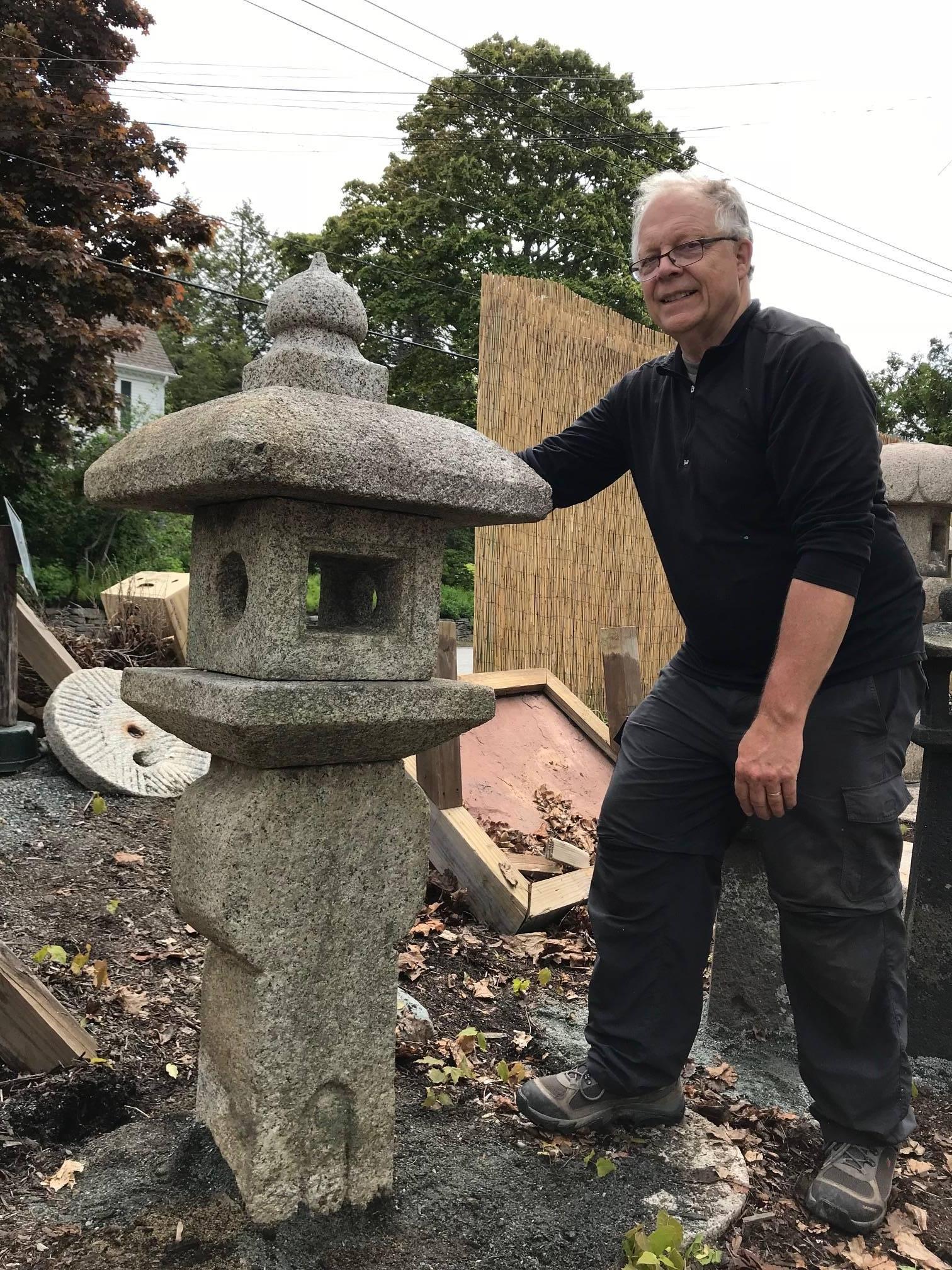 Japan “Oribe” granite stone lantern with a very nice warm old patina from good age, early 20th century. This is the classic Tea Master Oribe's style first observed in about the 17th century.
An unusual figure is carved on lower base.

A beautiful