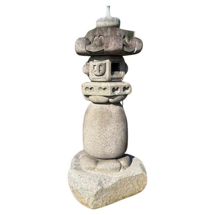 
A tall 88 Inch antique classic tea motif lantern with all original pieces.

Please view the video.

The Zendō-ji Gata lantern Ishidōrō (禅導寺型石灯籠) is a unique design and very special Japanese stone lantern. It has a uniquely characteristic rounded